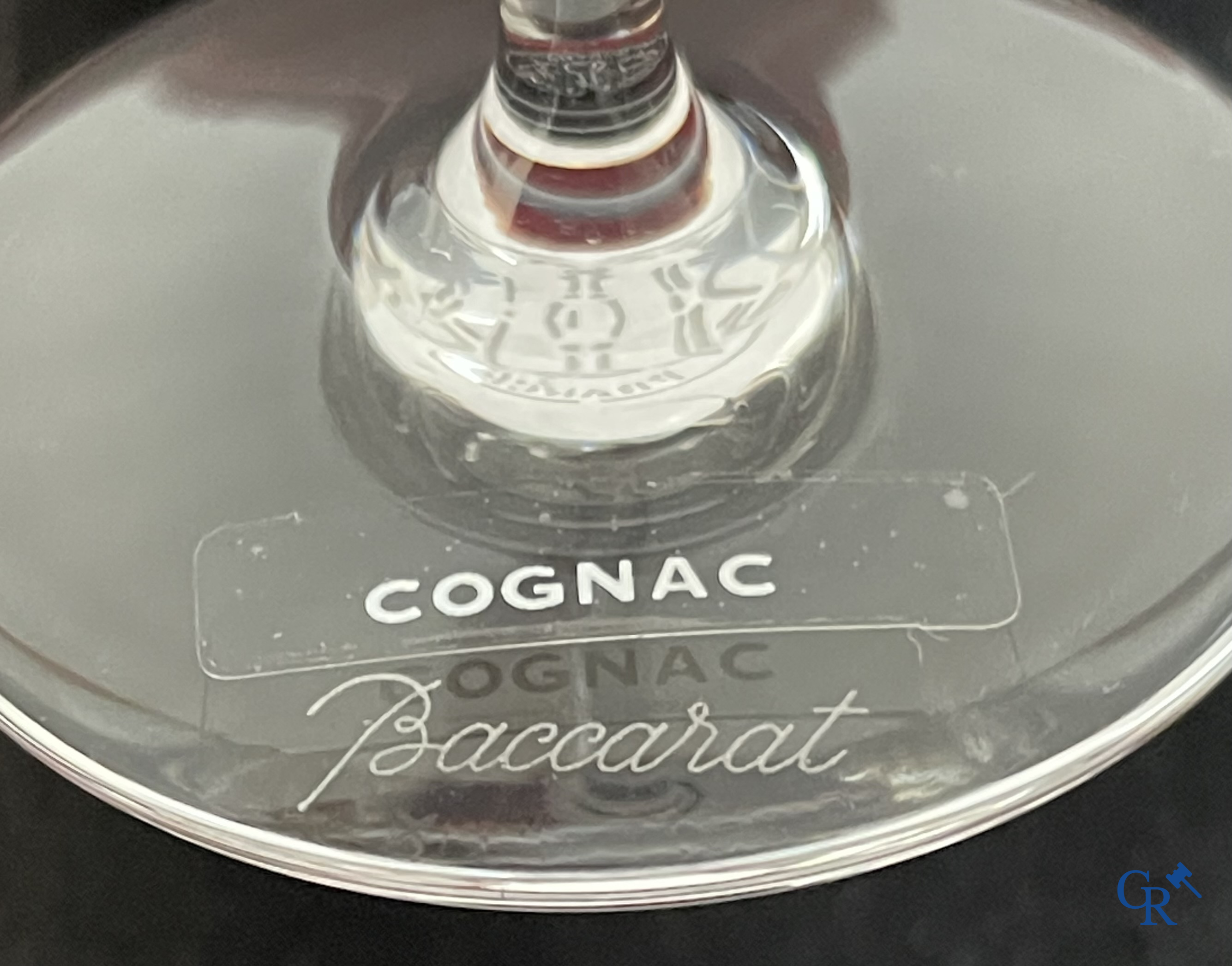 Baccarat. A set of 12 crystal cognac glasses in their original red box. Signed. New condition.