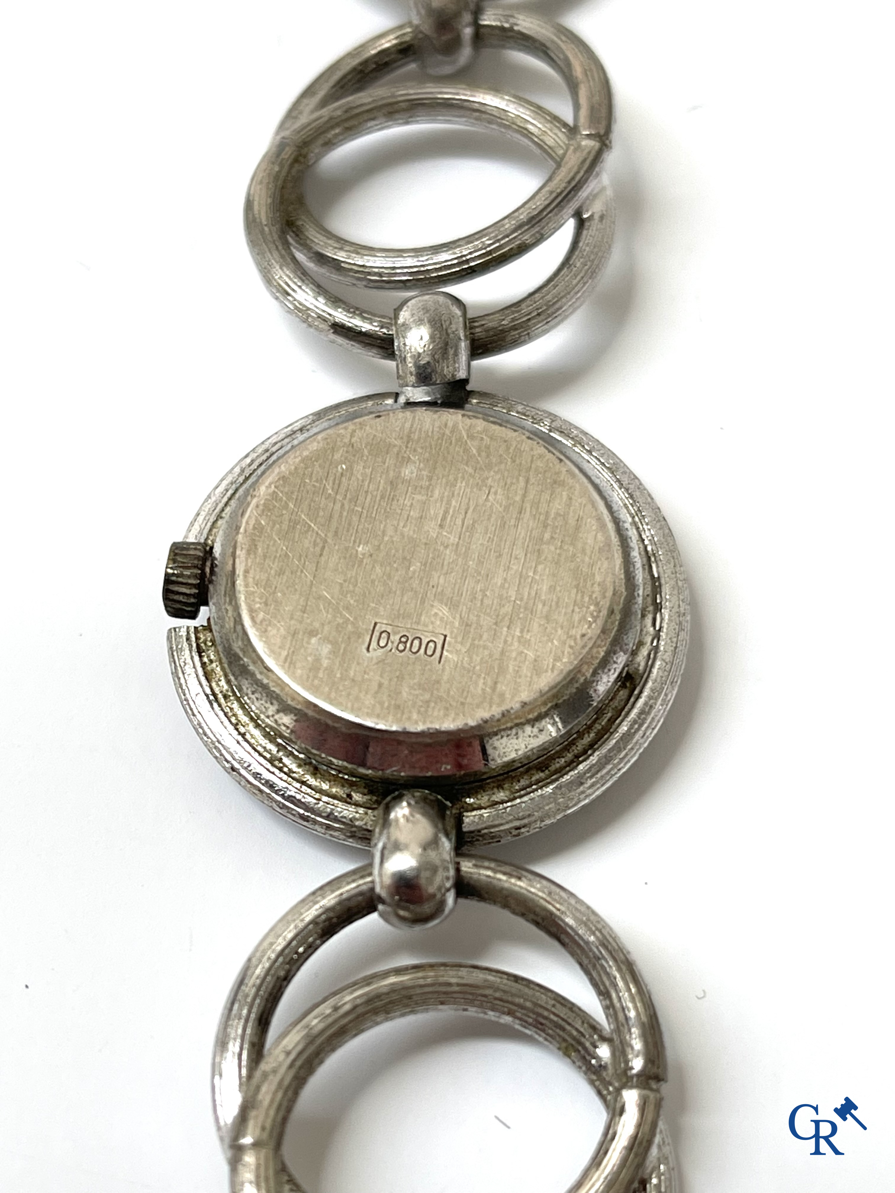 Ladies wristwatch Jan Brix in silver 800°/00, Swiss work and a necklace in enamel and plaque or marked Carven.
