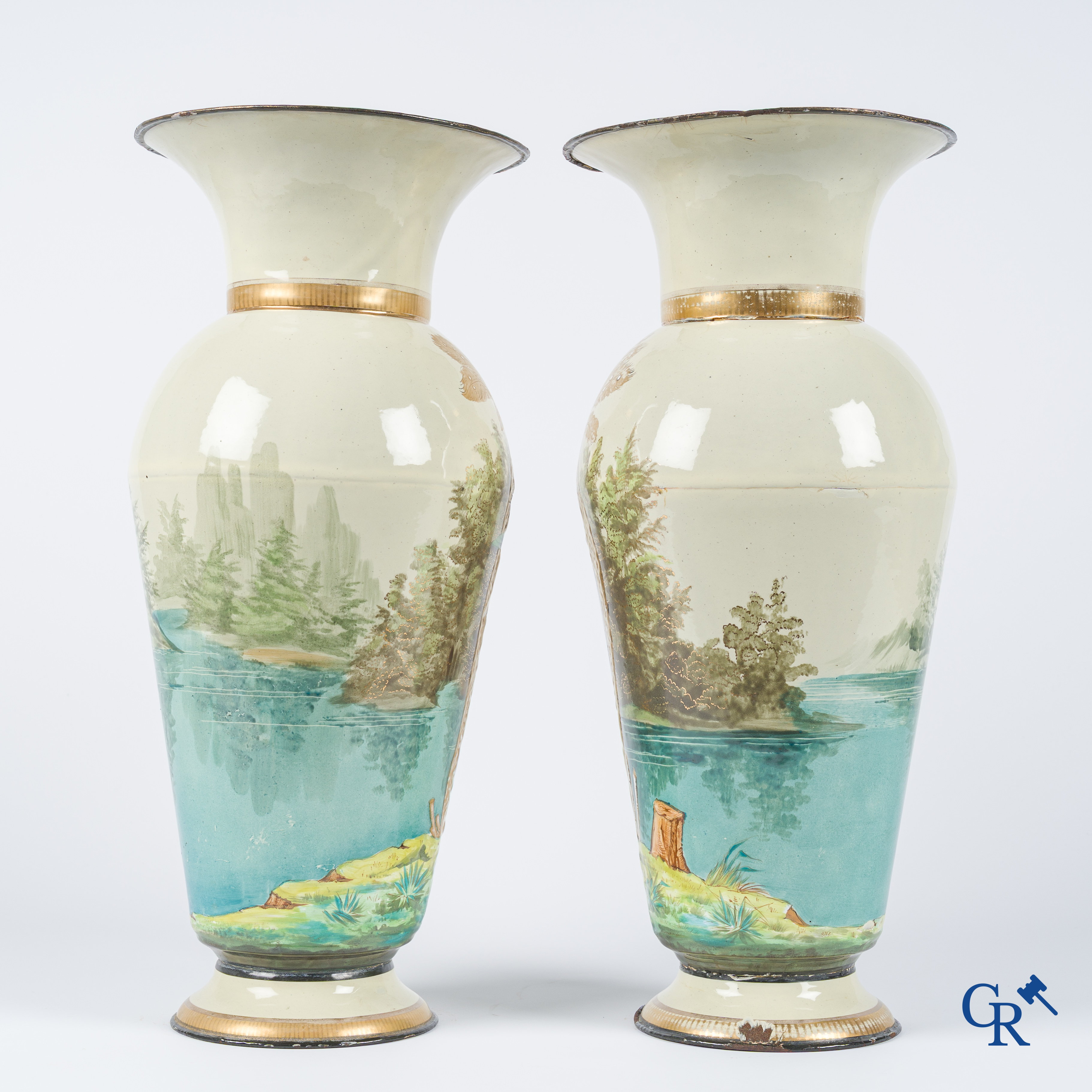 Pair of embossed enamelled metal vases with a decor of birds. Circa 1900.