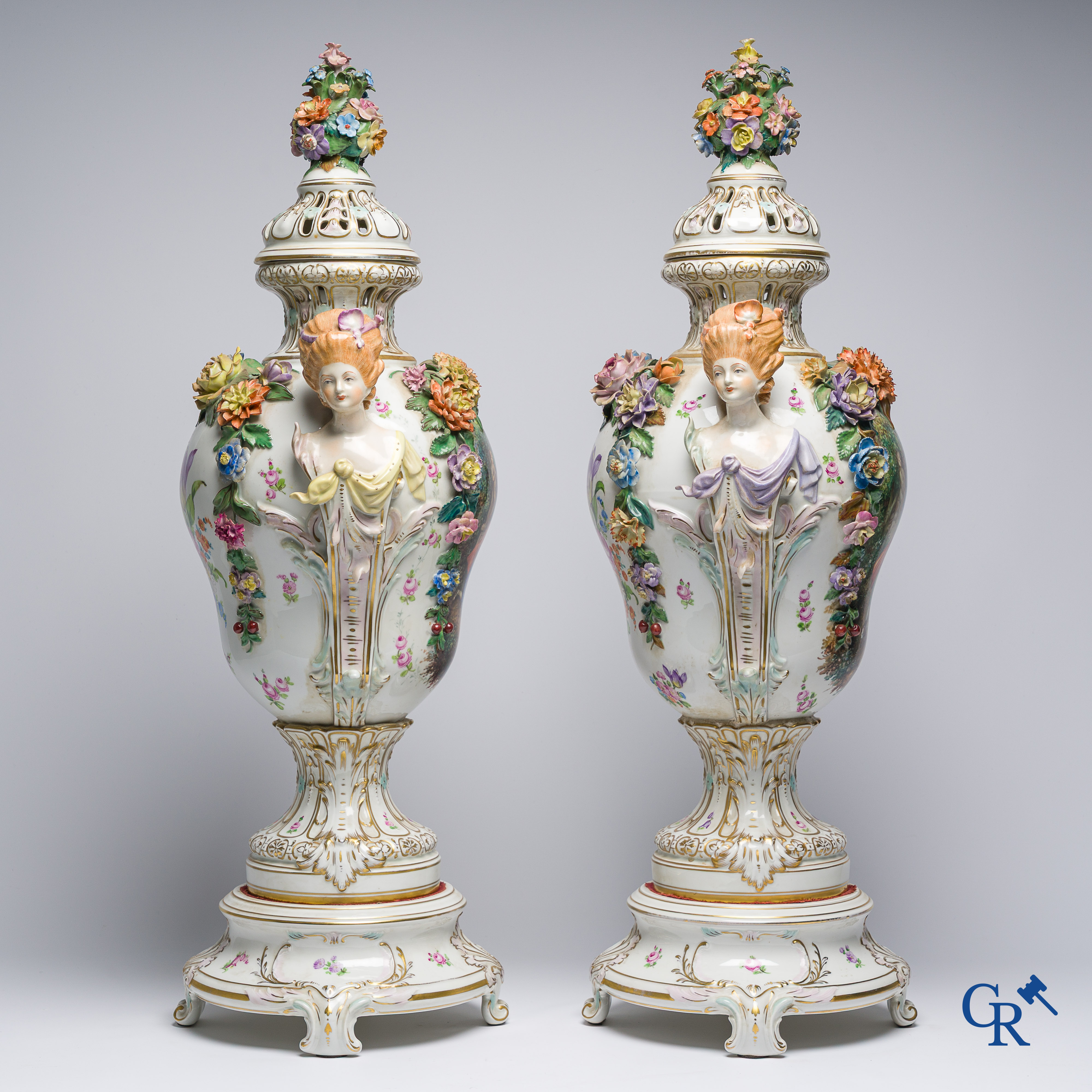 Dresden, German porcelain. Pair of large lid vases with romantic scenes. On base. Marked and numbered.