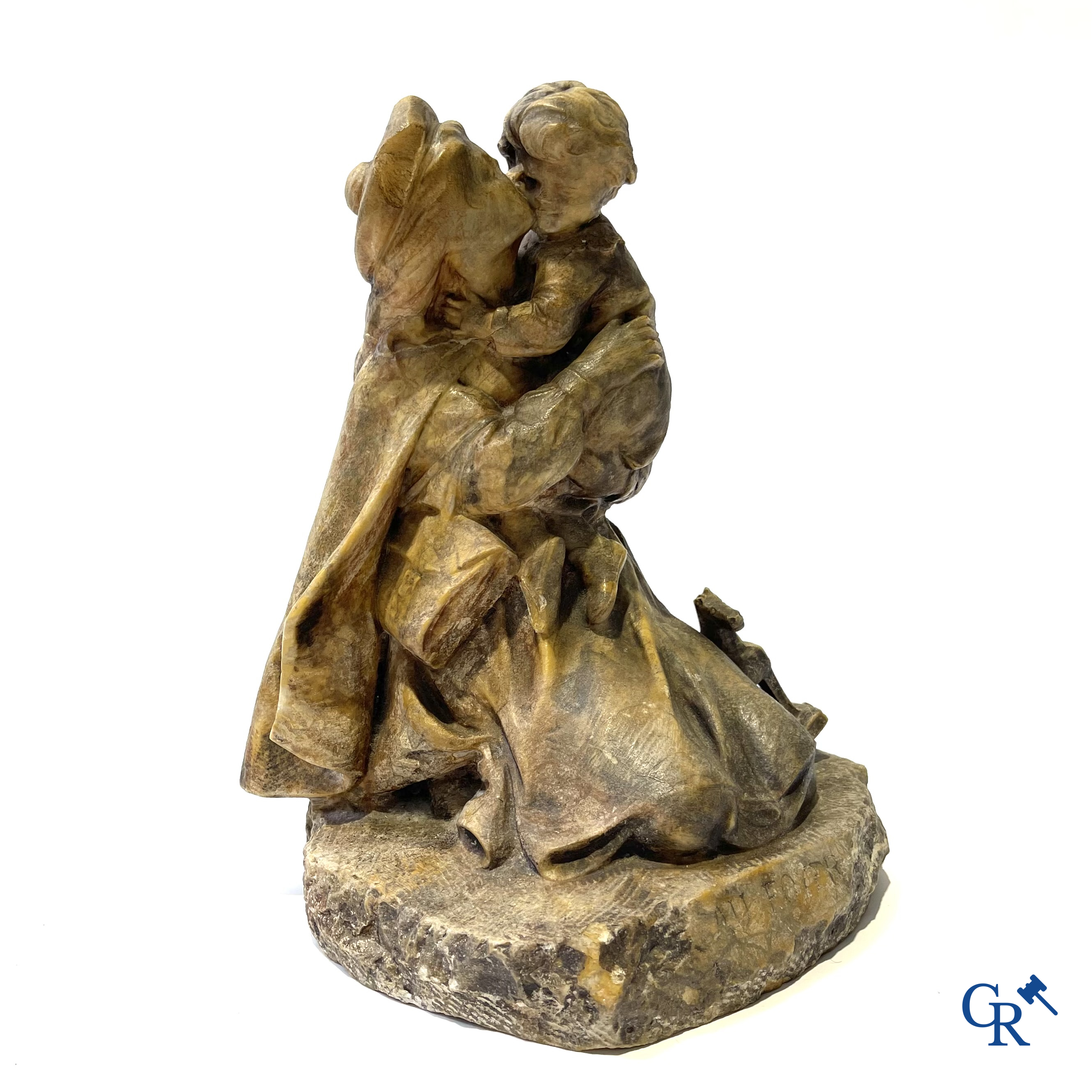 Louis J. Convers (1860-1915) French sculptor. "Au Foyer" Mother with child in sculpted rock. Around 1900.