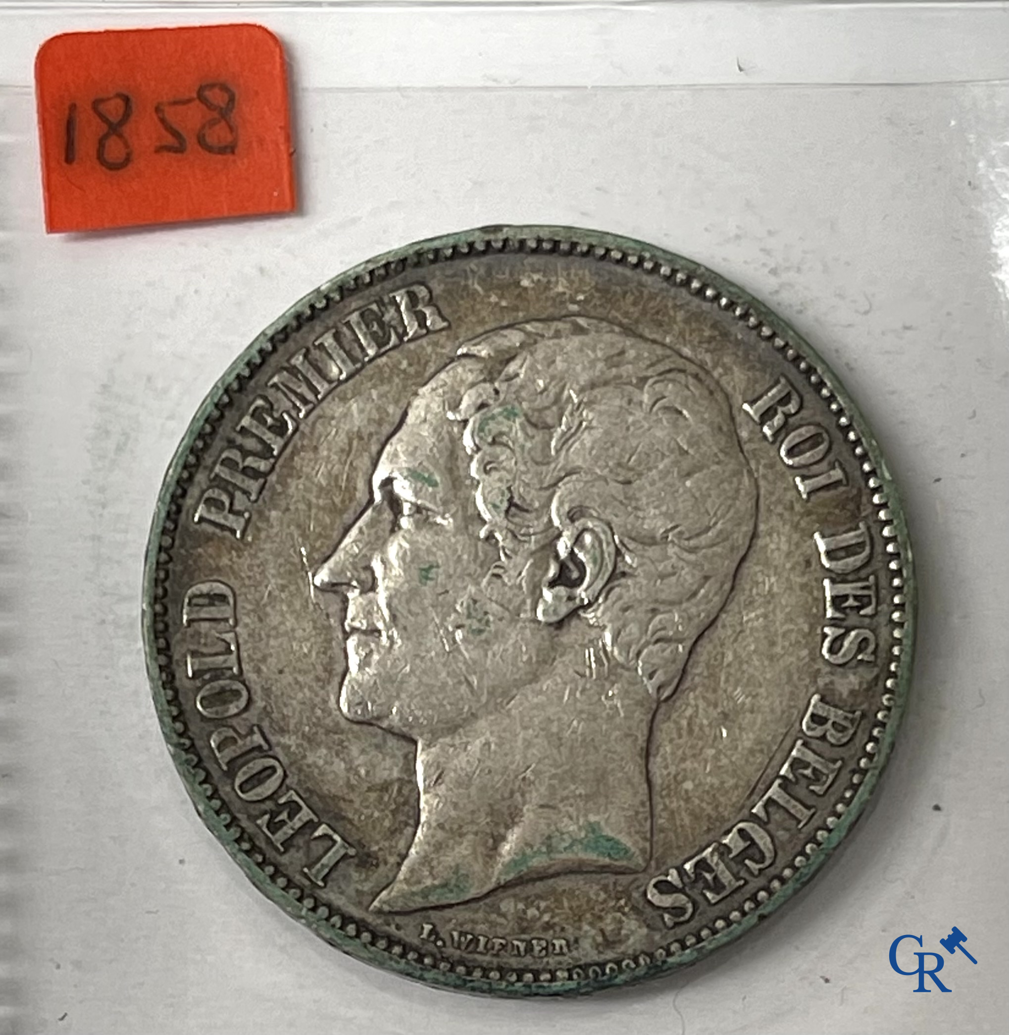 Old coins and banknotes. A large collection of old coins and banknotes. Multiple coins in silver.