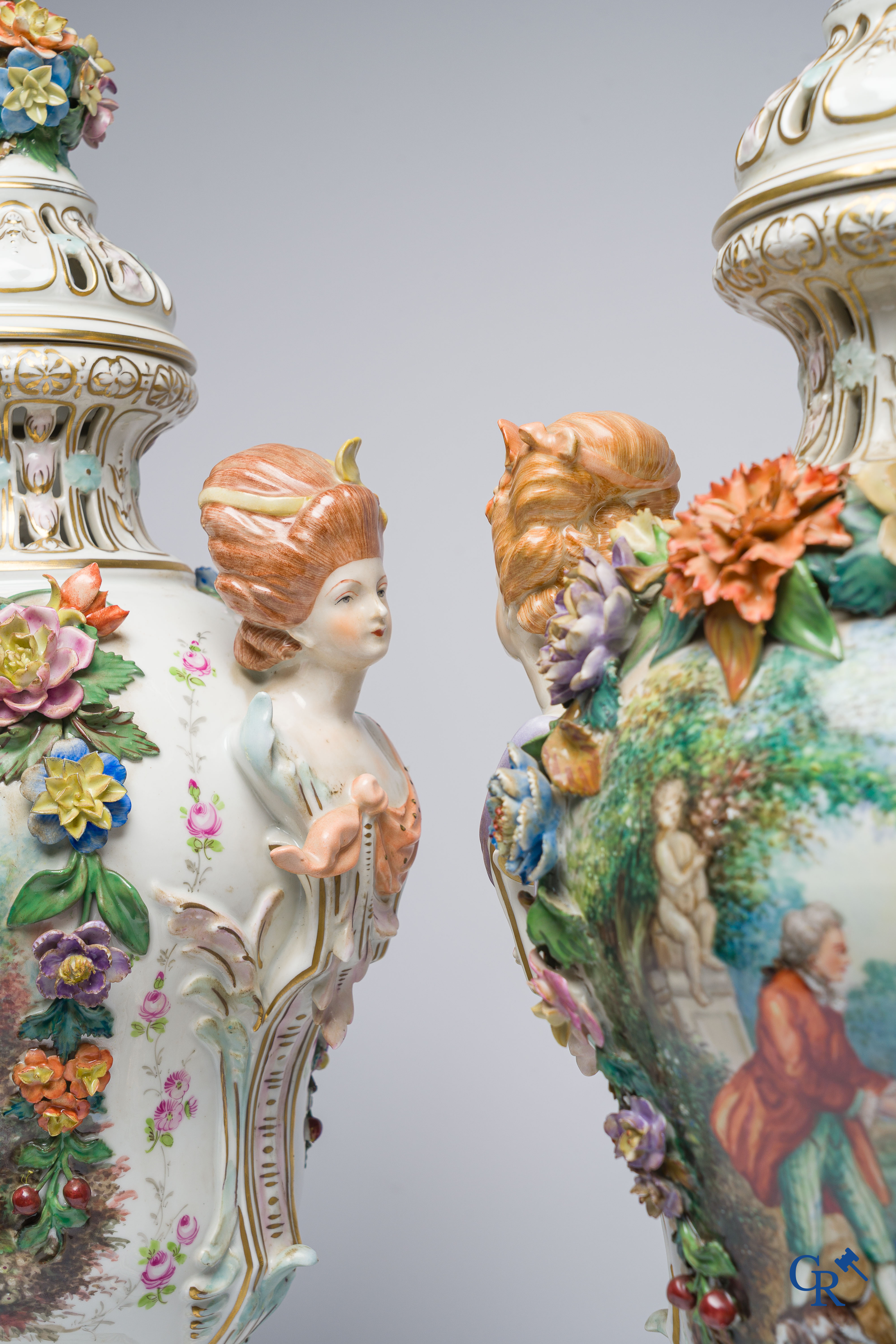 Dresden, German porcelain. Pair of large lid vases with romantic scenes. On base. Marked and numbered.