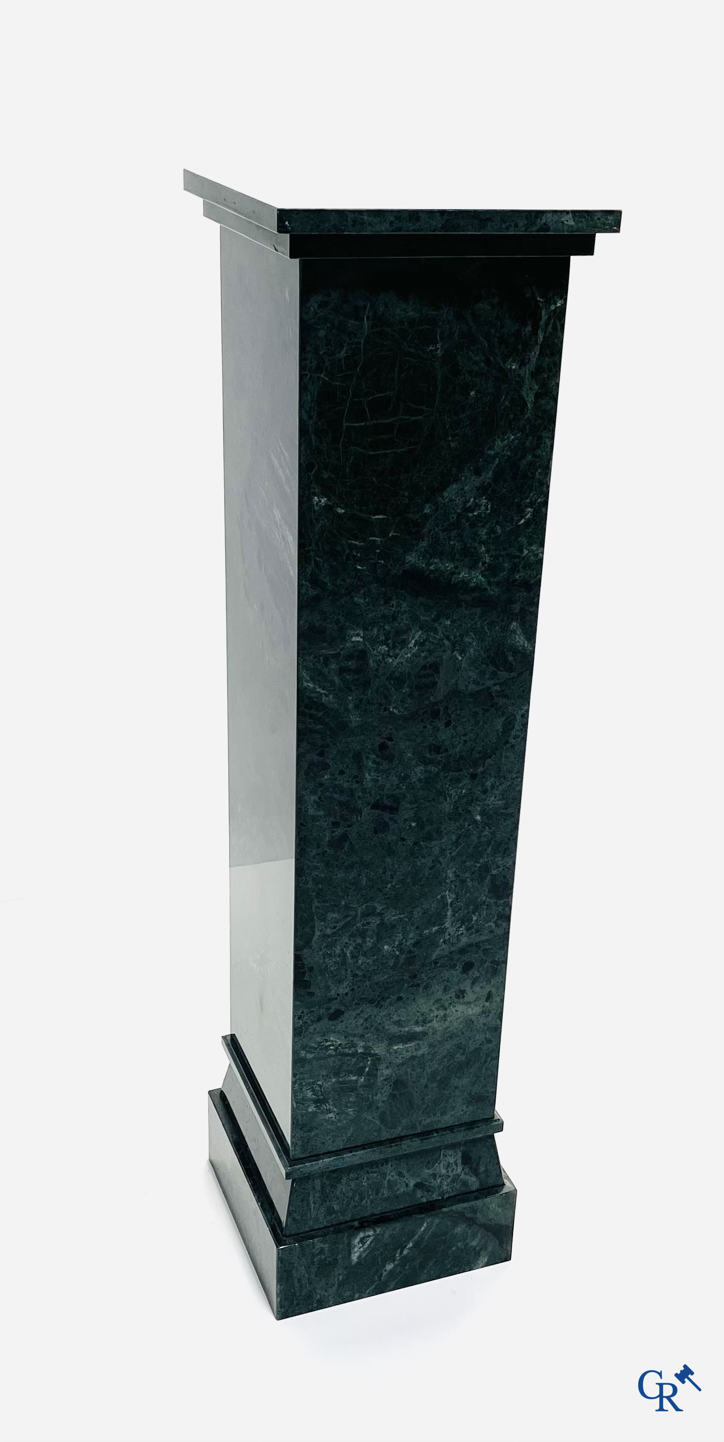 A large pedestal in green marble. 20th century.