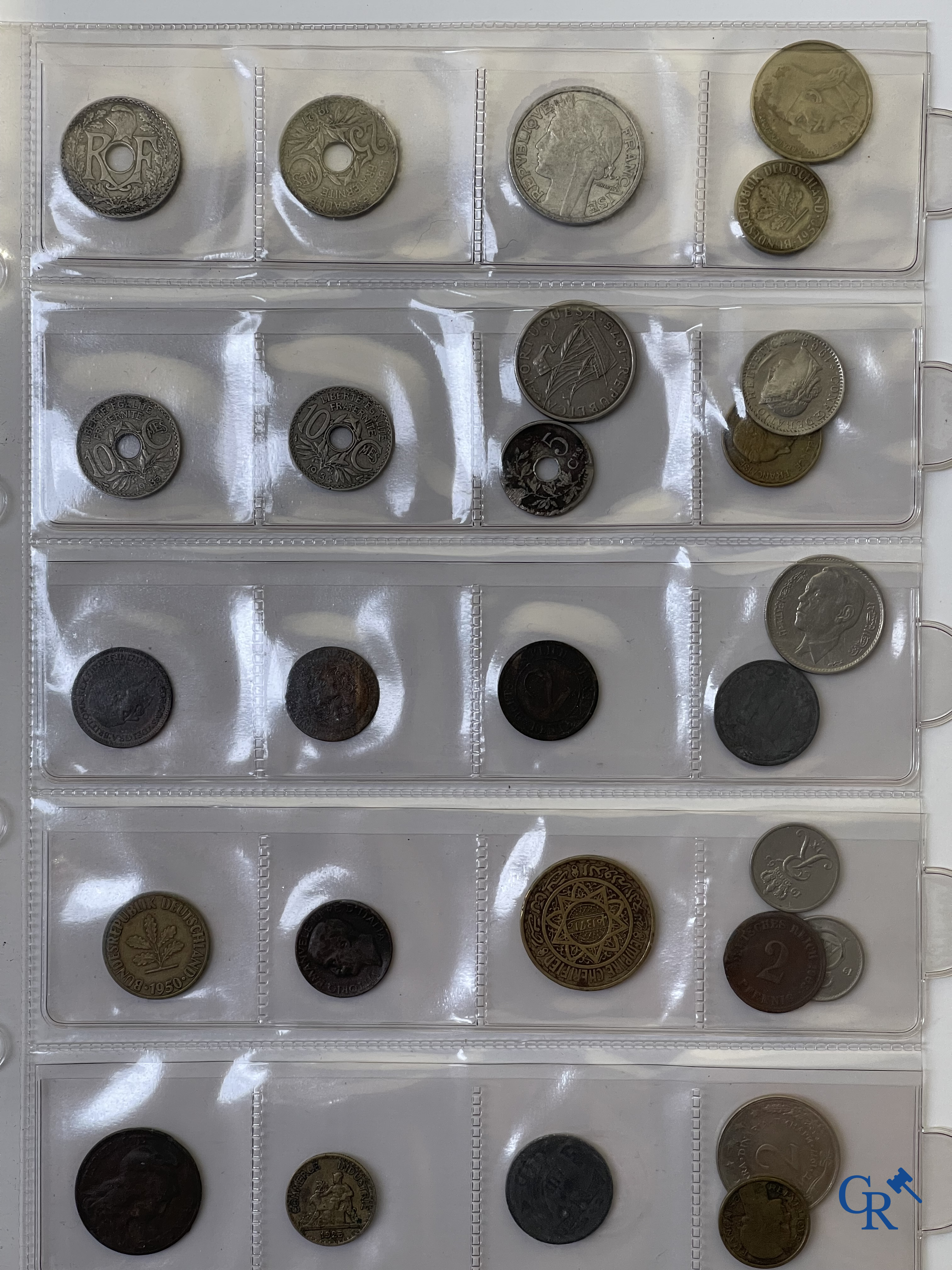 Coins. A folder of collectible coins including silver coins.