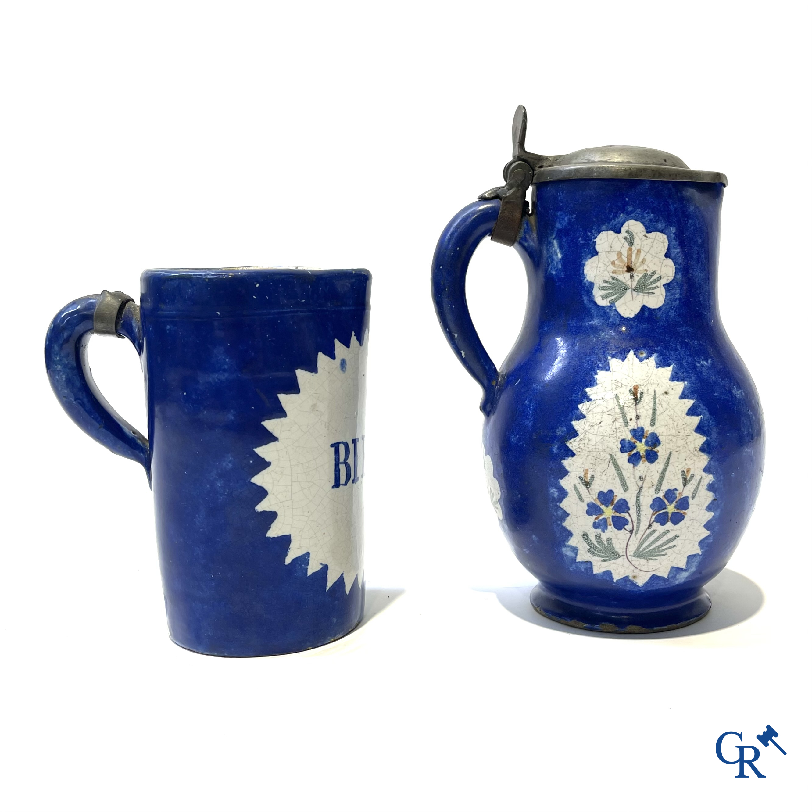 Brussels pottery. 3 jugs with tin lid and a beer jug in decorated Brussels pottery. 18th-19th century.