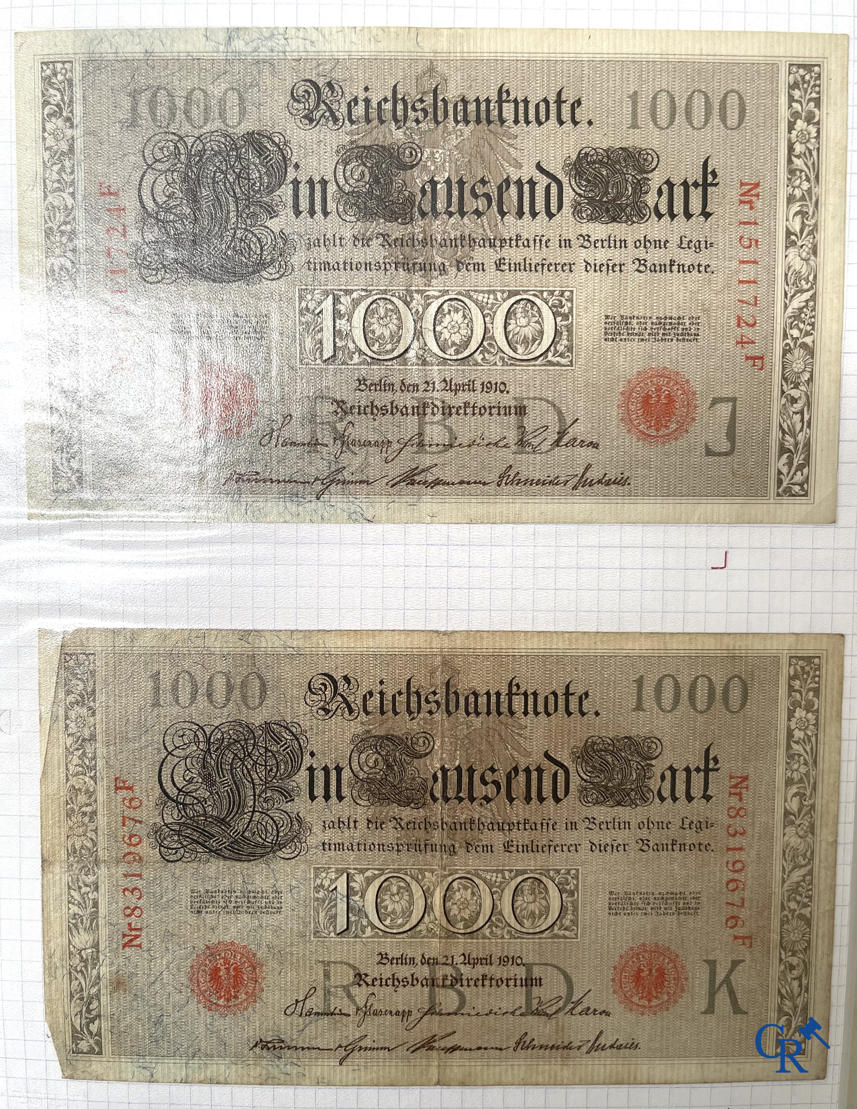Old coins and banknotes. A large collection of old coins and banknotes. Multiple coins in silver.