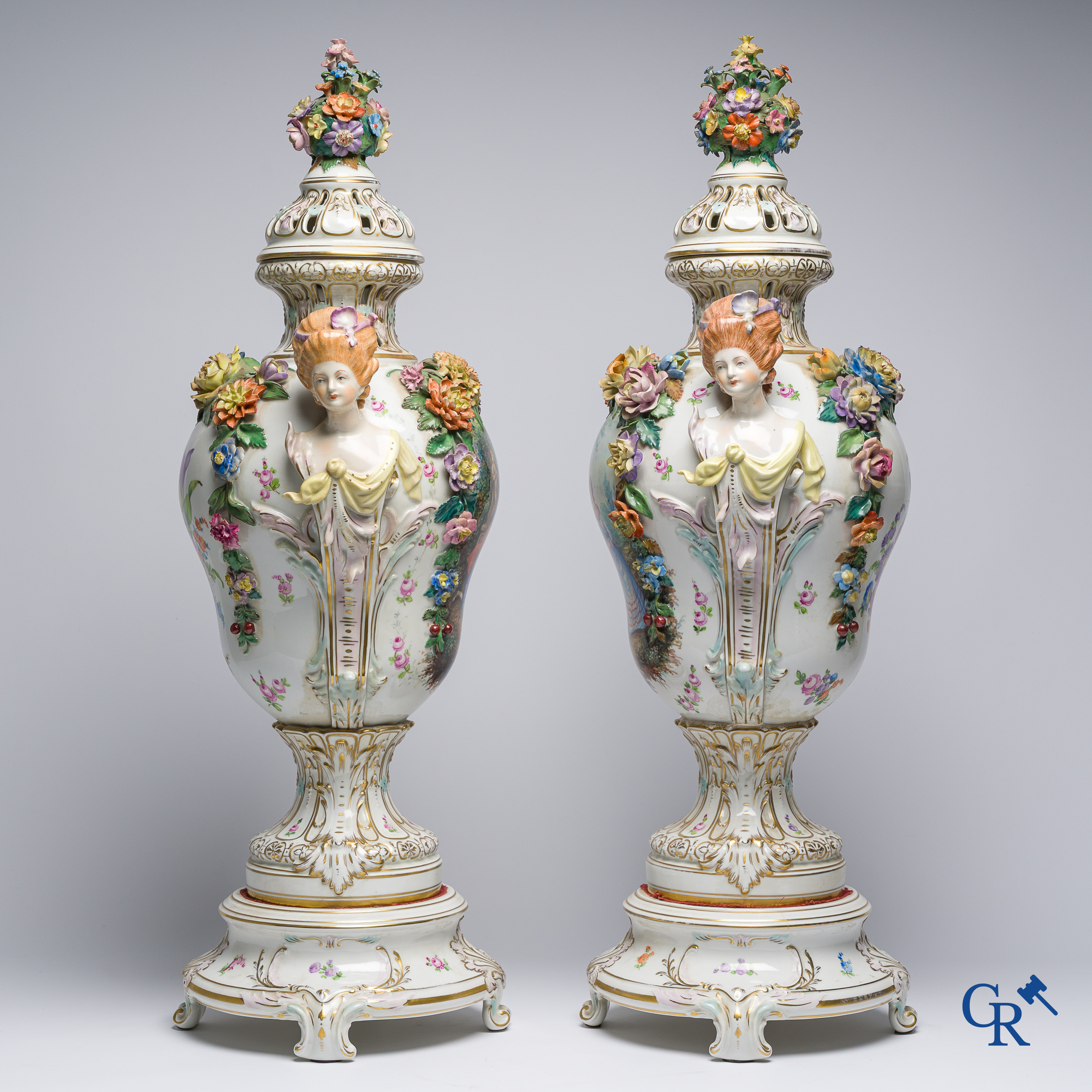 Dresden, German porcelain. Pair of large lid vases with romantic scenes. On base. Marked and numbered.