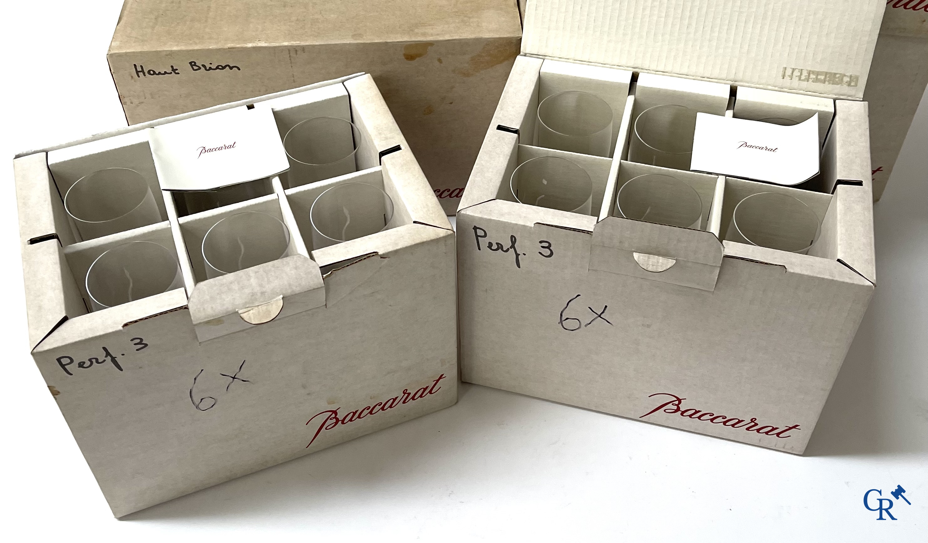 Baccarat France. A large lot (87 pieces) with crystal glasses. Mostly in the original box. Signed.