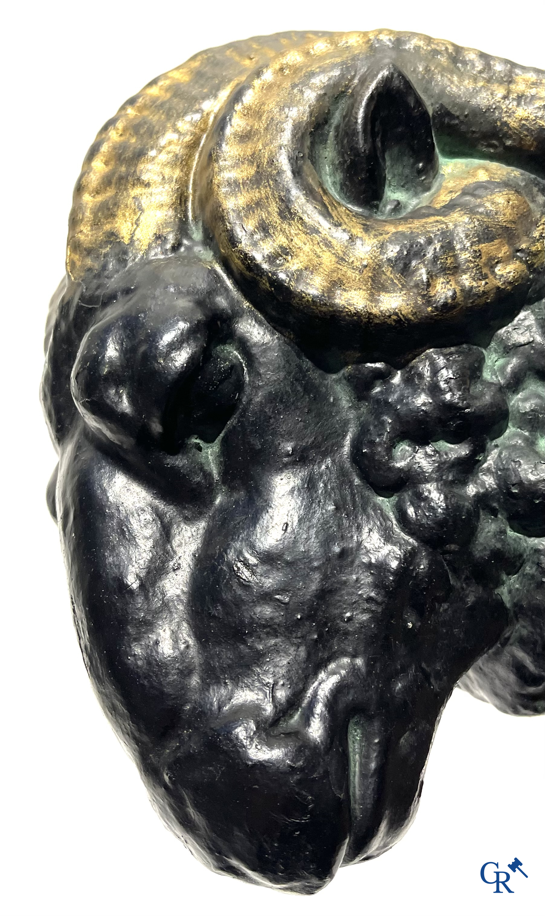 Butchery signboard. Pair of ram heads in zinc serving as façade decoration for a butchery. Circa 1900-1930.