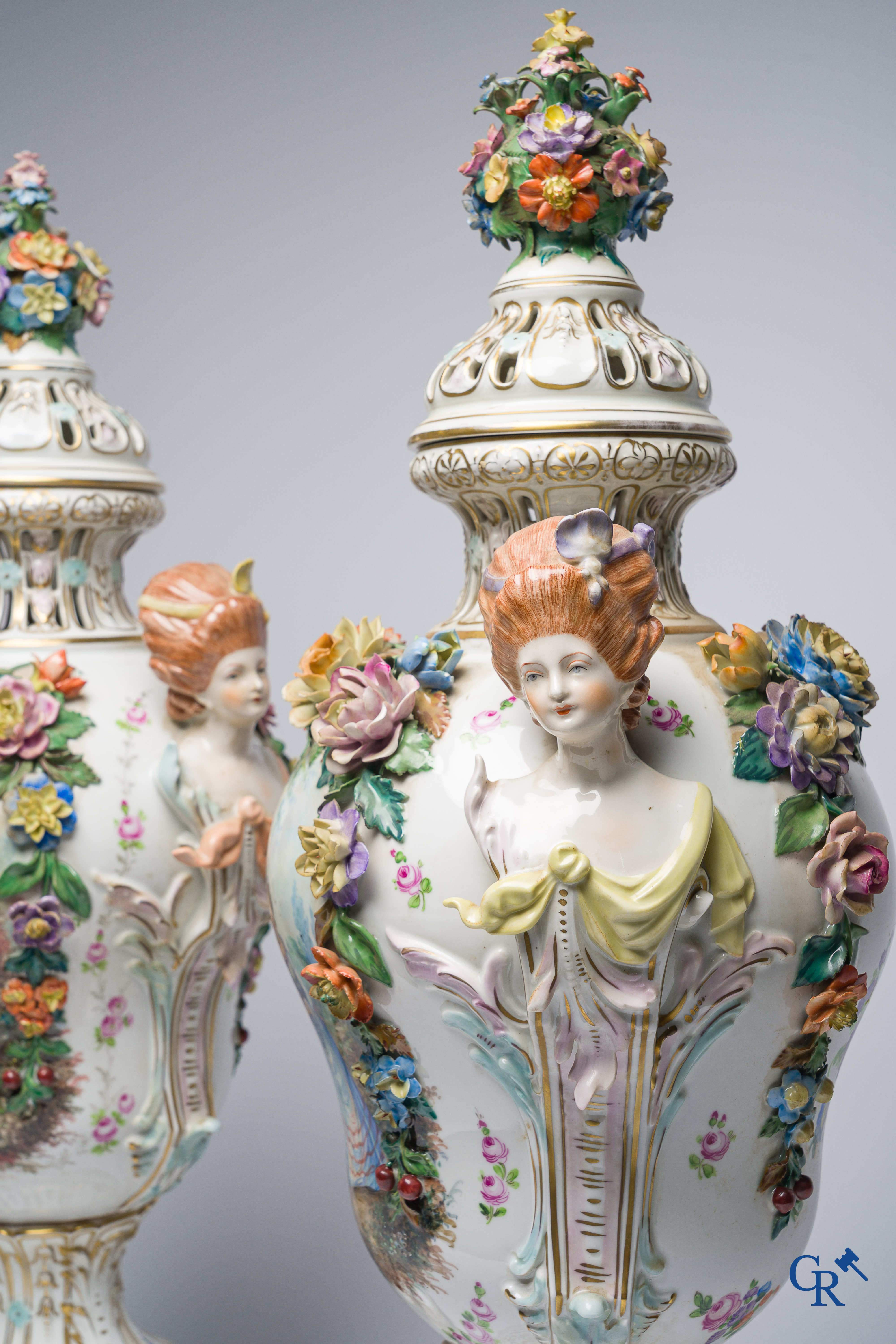 Dresden, German porcelain. Pair of large lid vases with romantic scenes. On base. Marked and numbered.