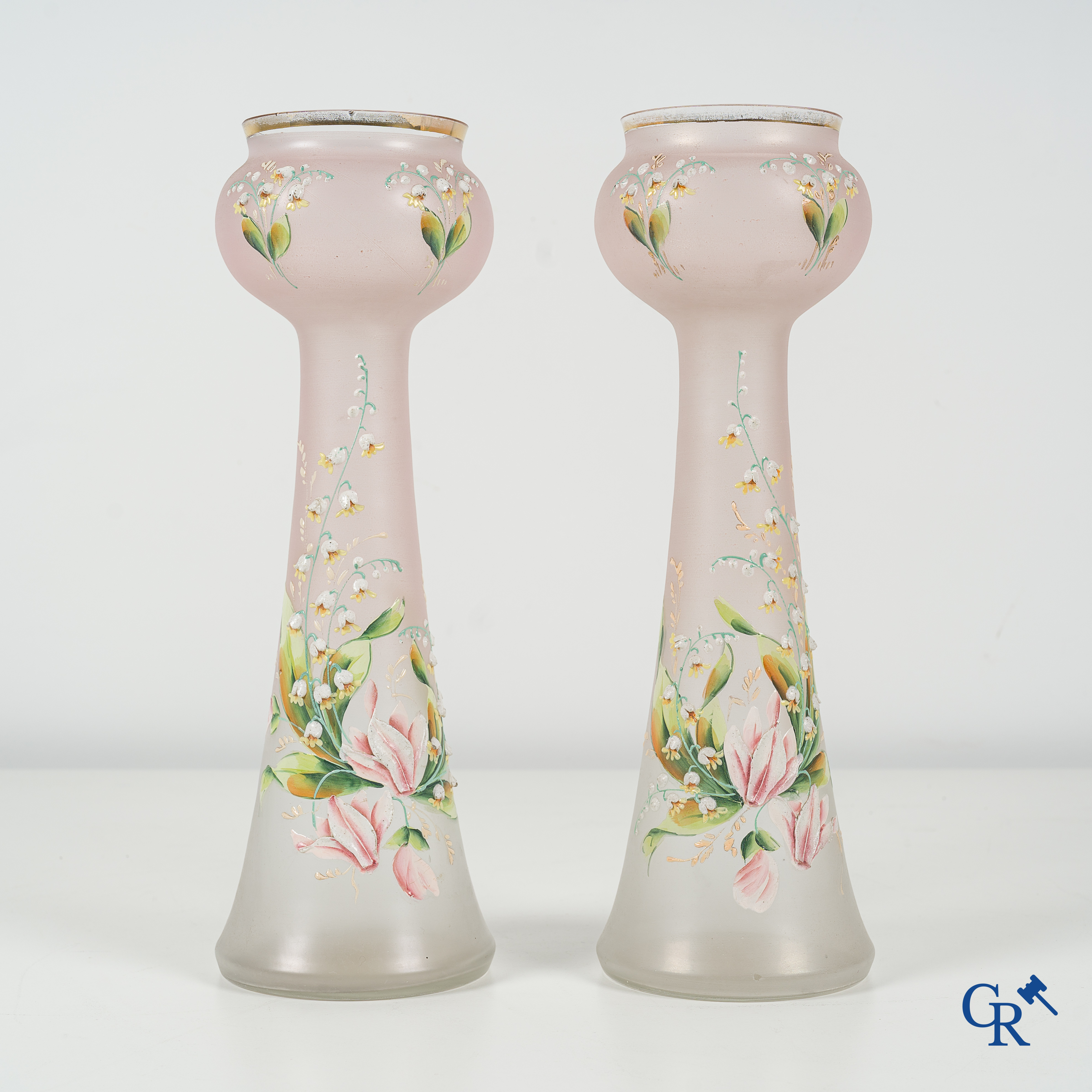 Art Nouveau. Lot consisting of a clock set in faience and bronze and a pair enamelled opaline vases.