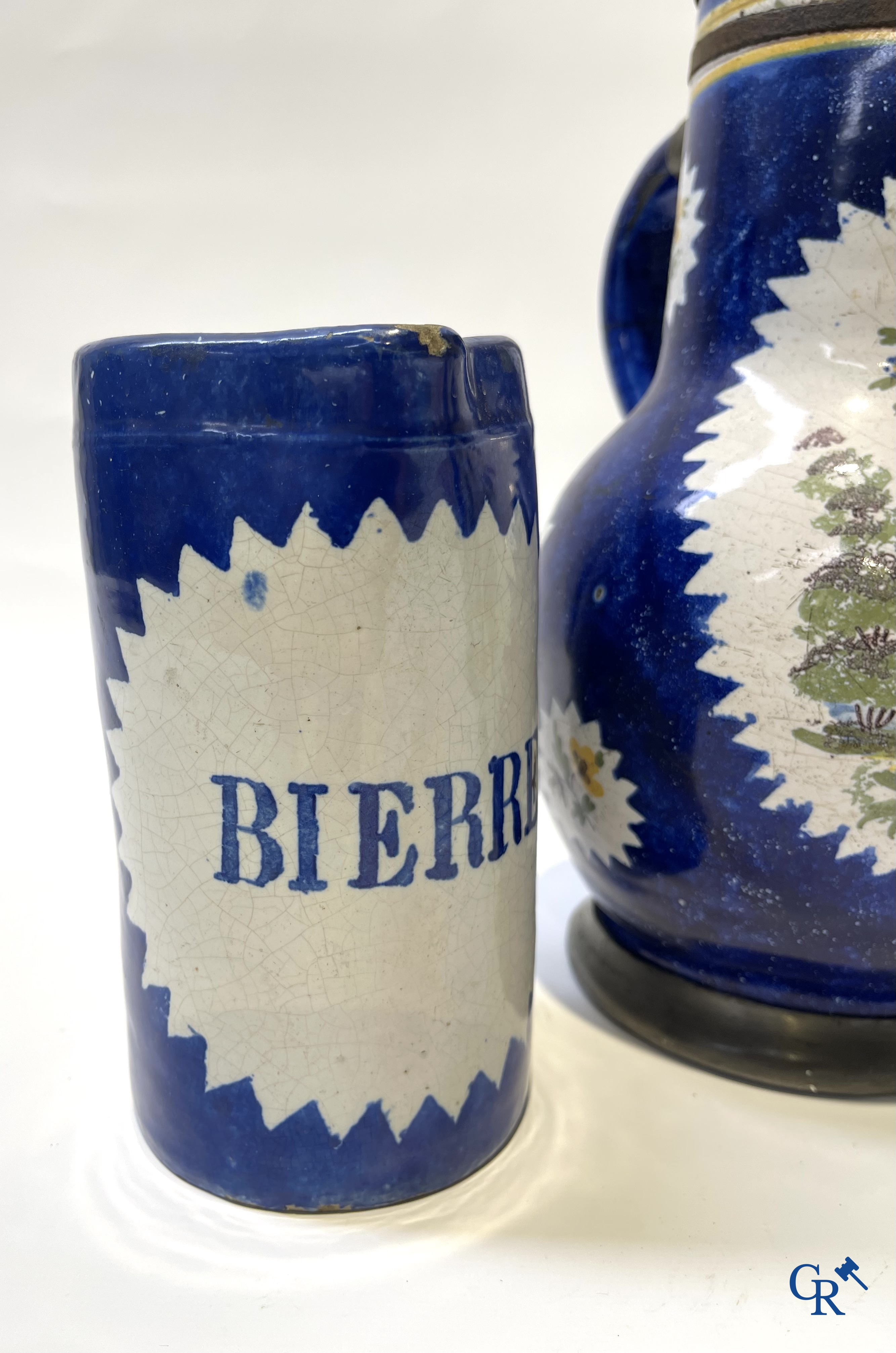 Brussels pottery. 3 jugs with tin lid and a beer jug in decorated Brussels pottery. 18th-19th century.