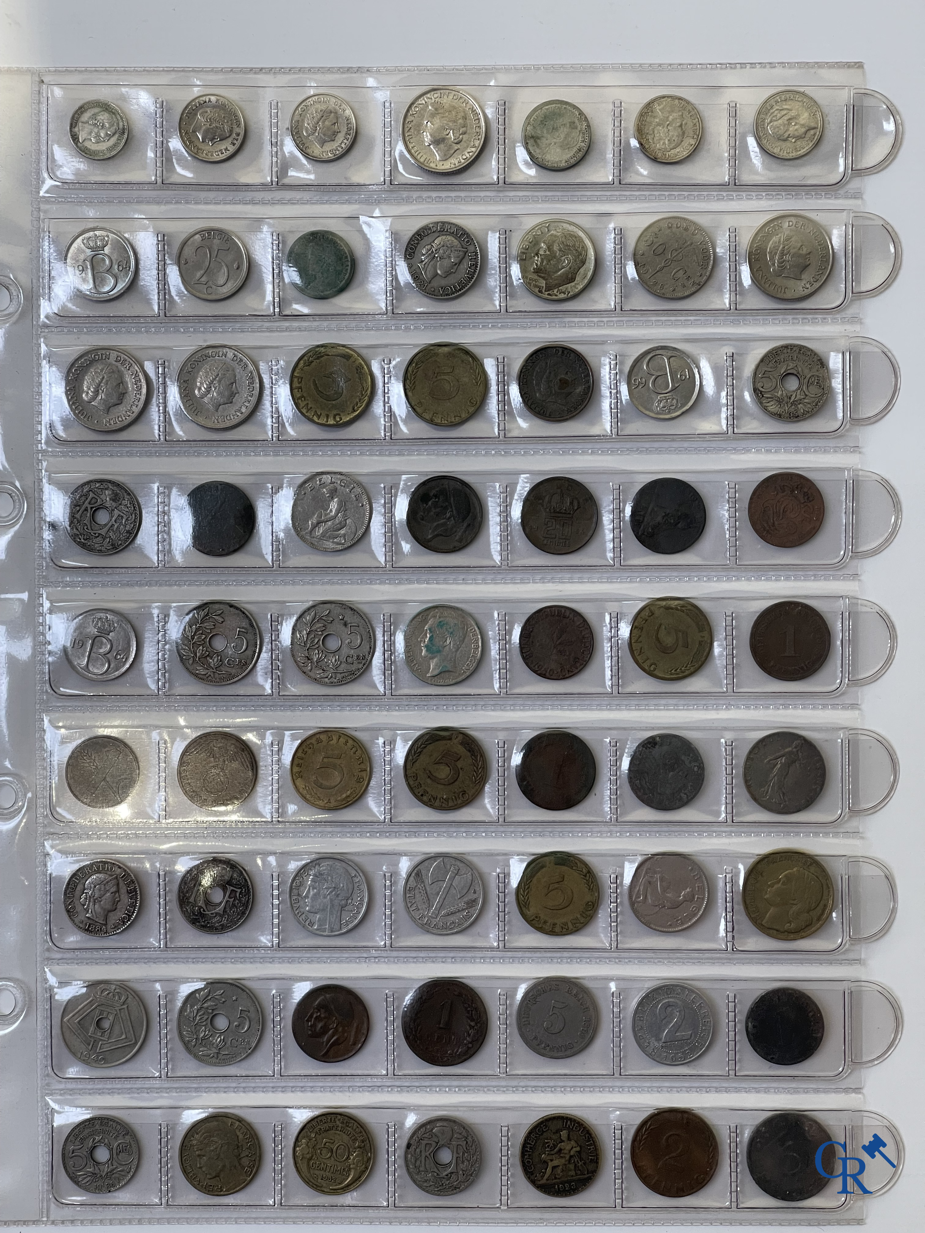 Coins. A folder of collectible coins including silver coins.