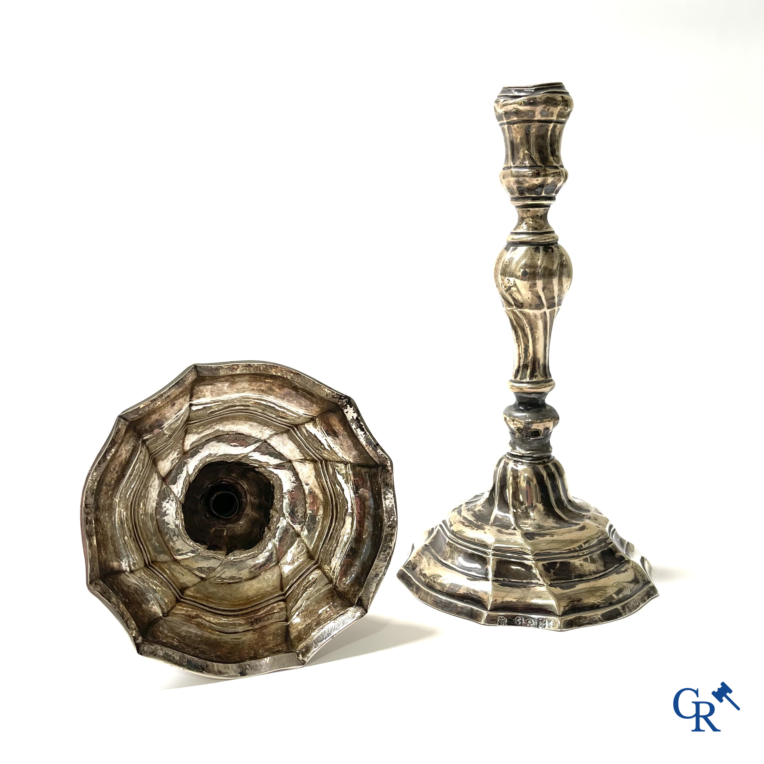 Silver. A pair of 18th century silver candlesticks. Multiple hallmarks.