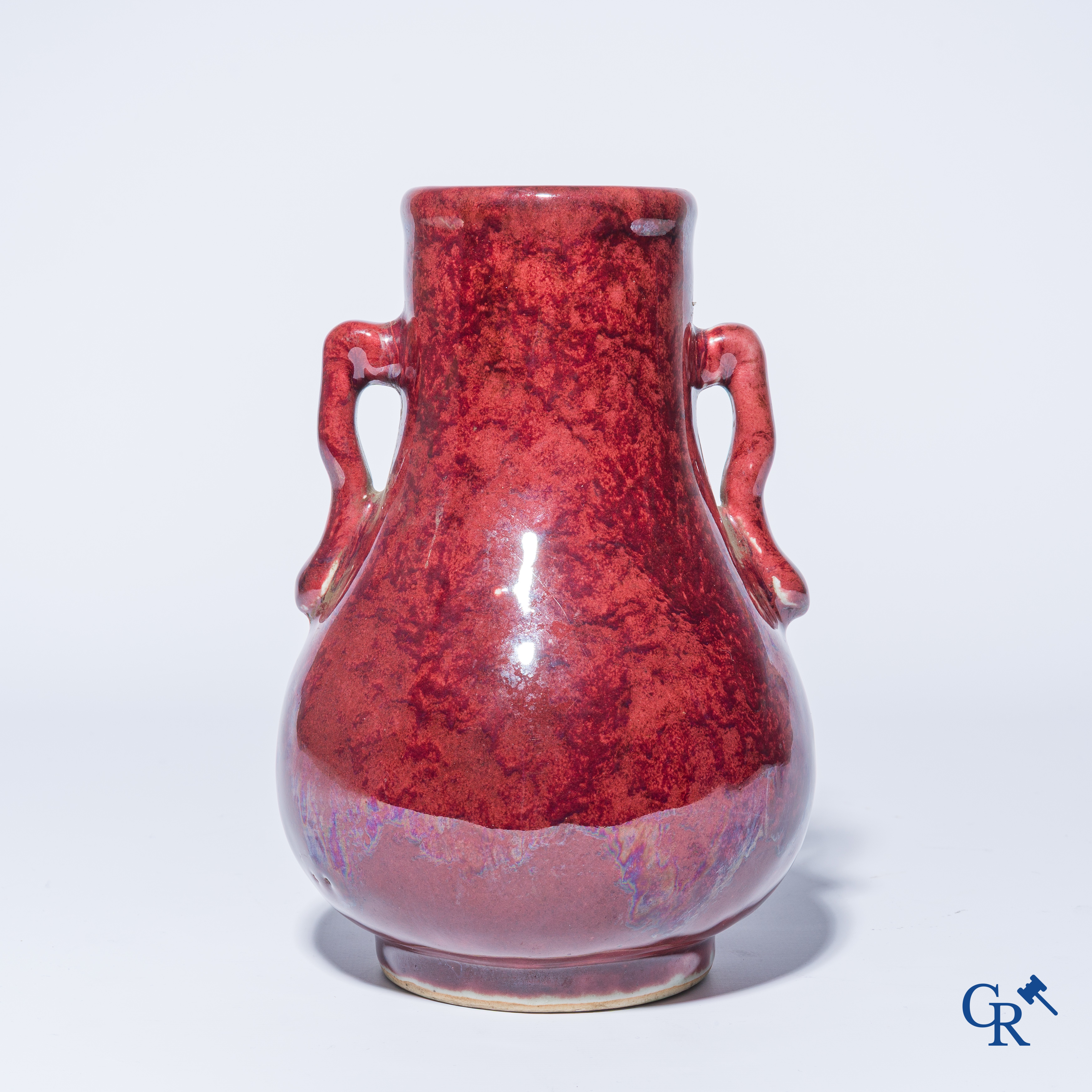 Asian Art. A Chinese porcelain Sang de boeuf vase. 19th century.