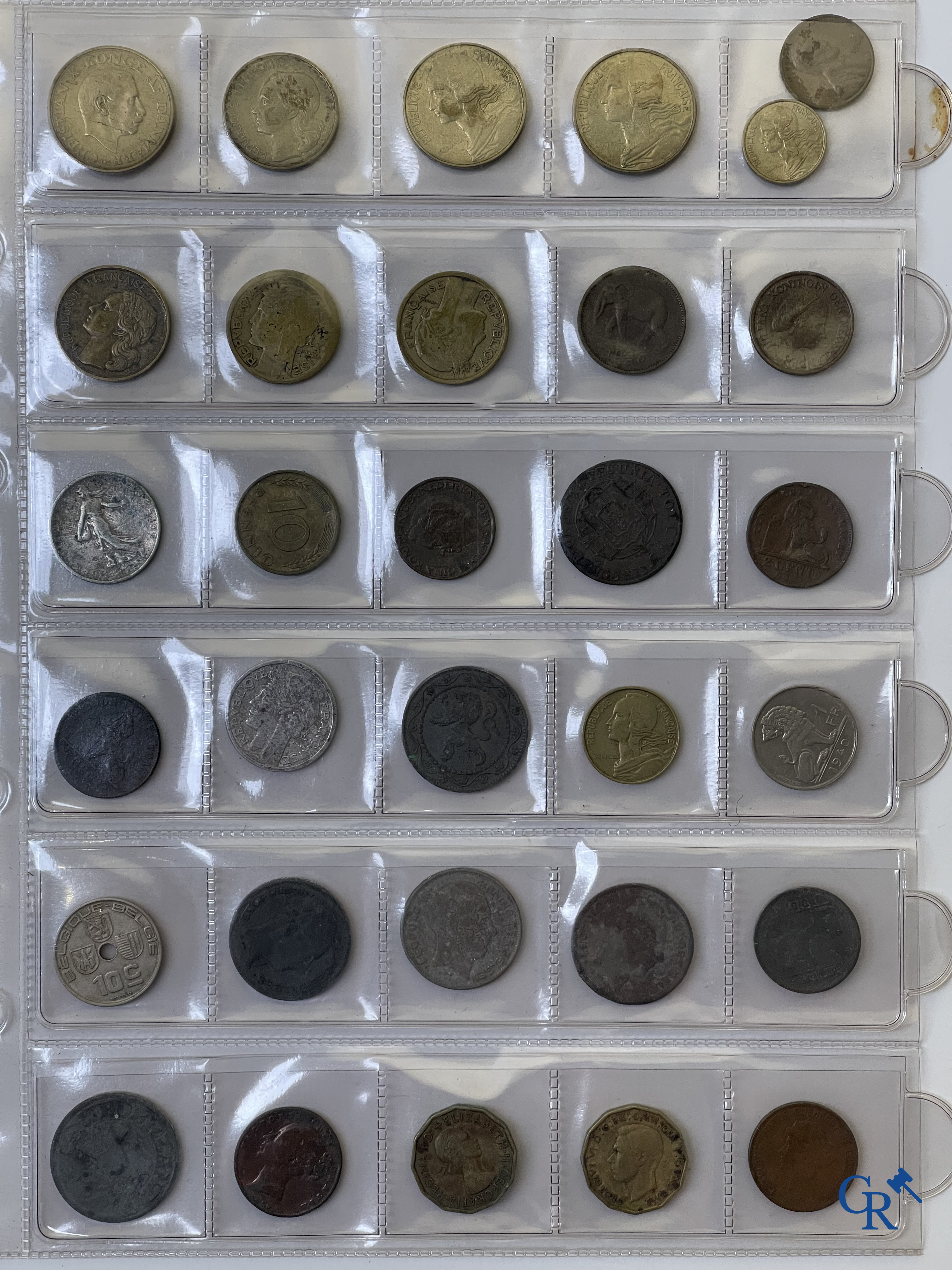 Coins. A folder of collectible coins including silver coins.