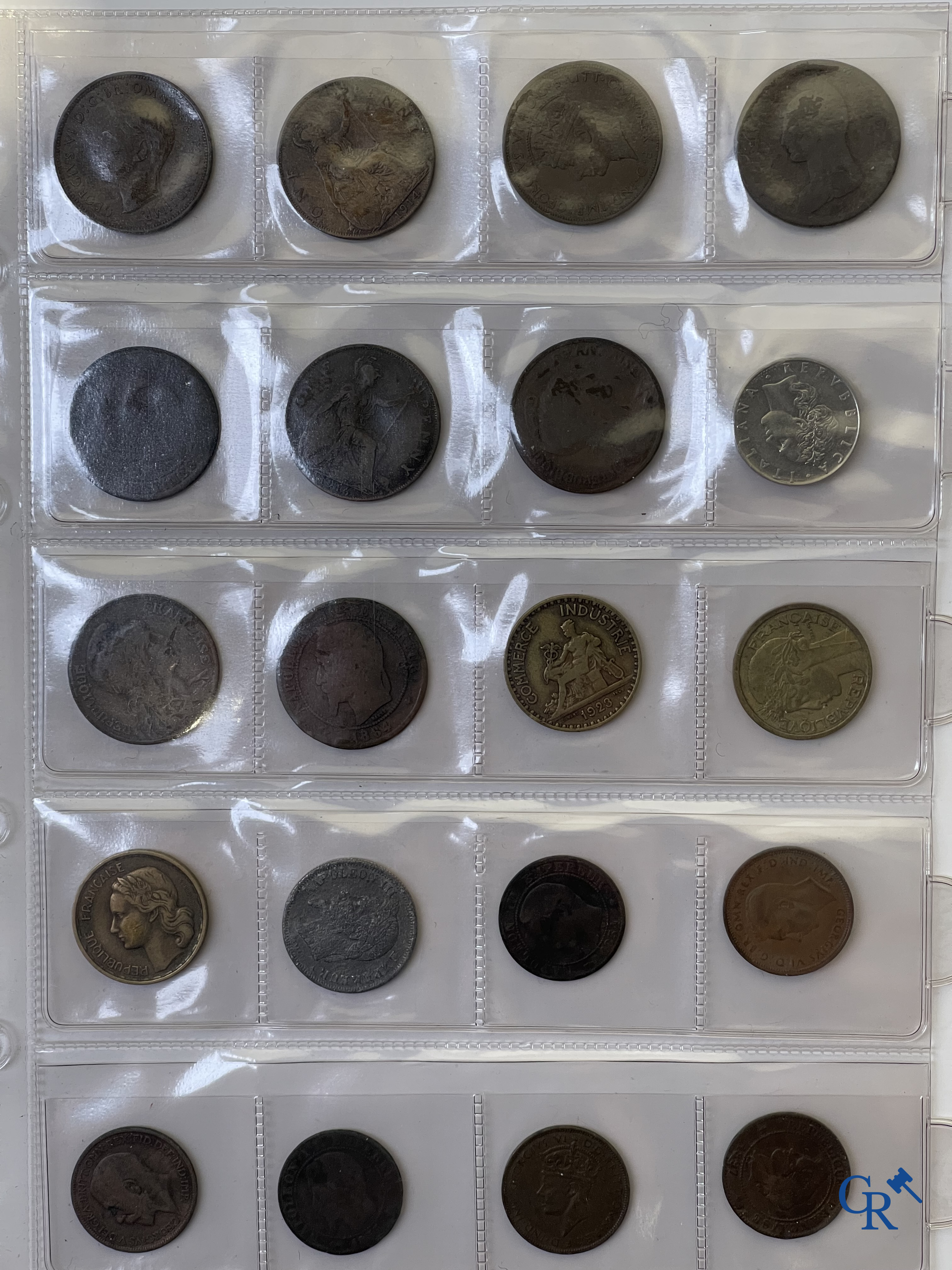 Coins. A folder of collectible coins including silver coins.
