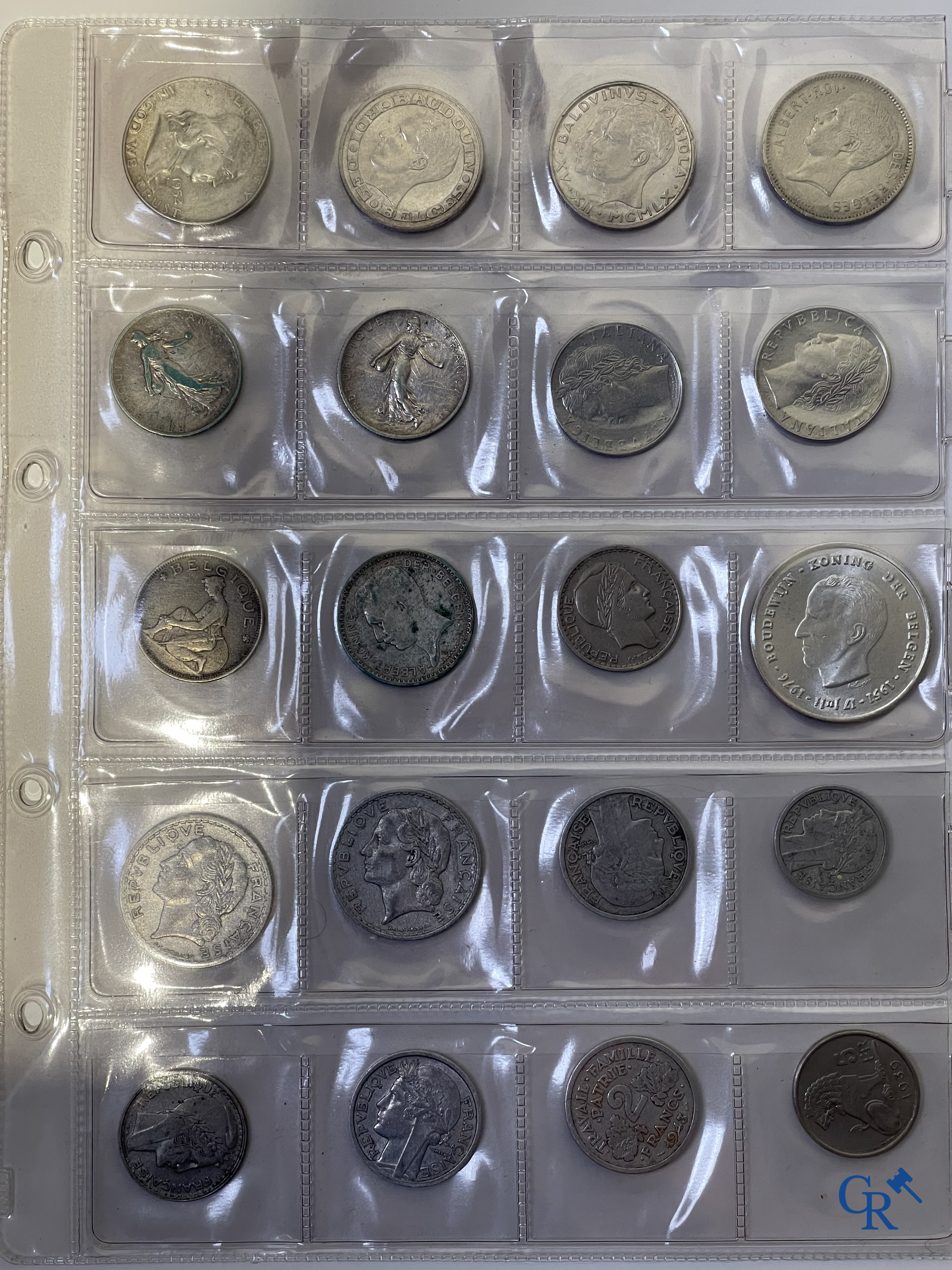 Coins. A folder of collectible coins including silver coins.