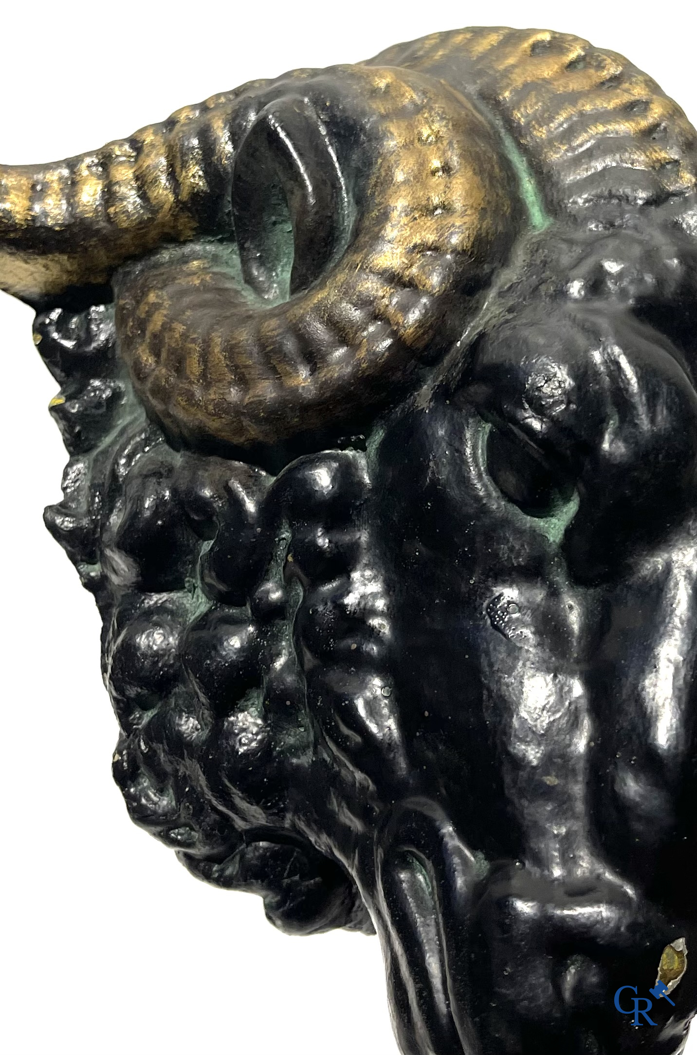 Butchery signboard. Pair of ram heads in zinc serving as façade decoration for a butchery. Circa 1900-1930.