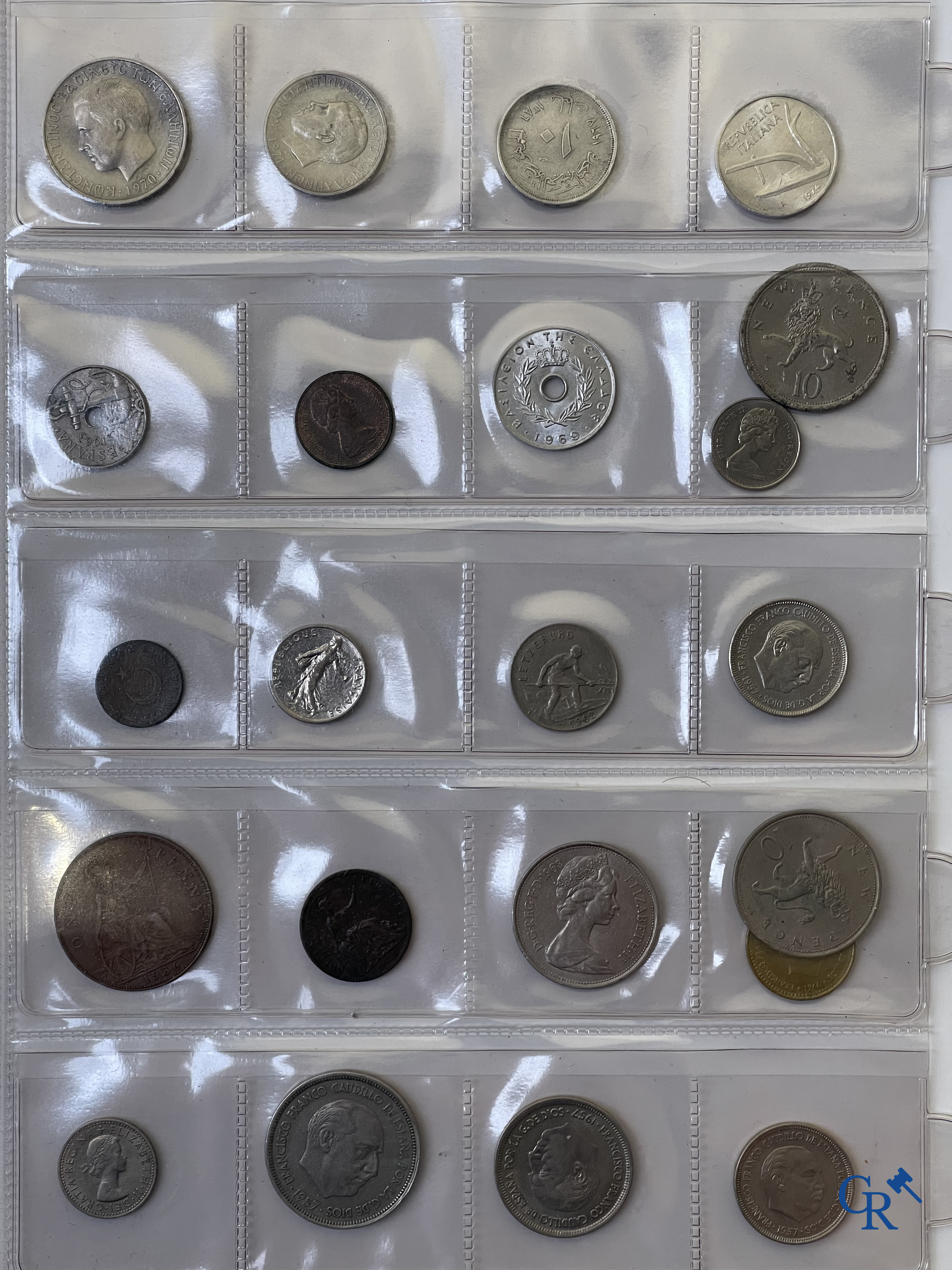 Coins. A folder of collectible coins including silver coins.