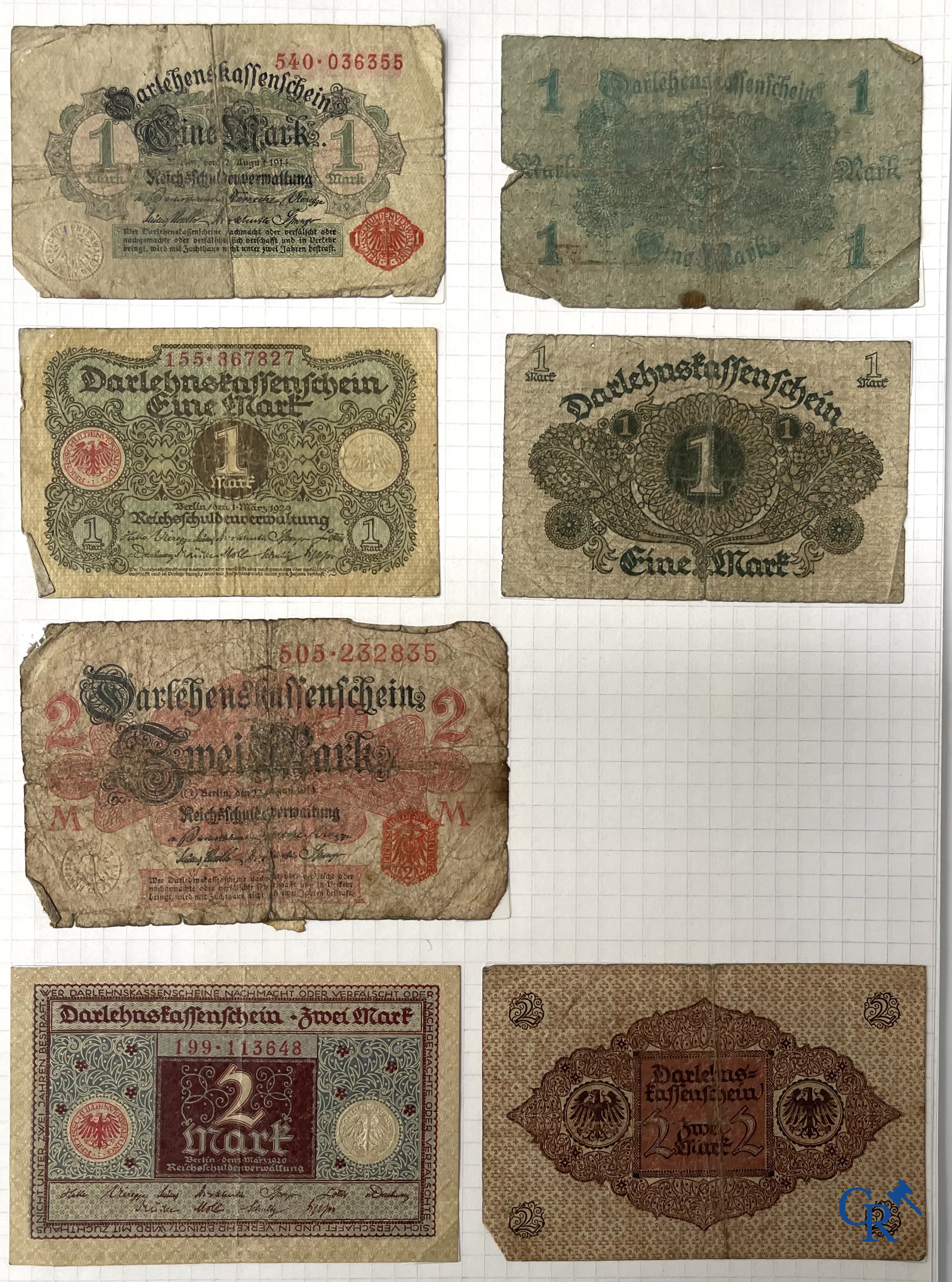 Old coins and banknotes. A large collection of old coins and banknotes. Multiple coins in silver.