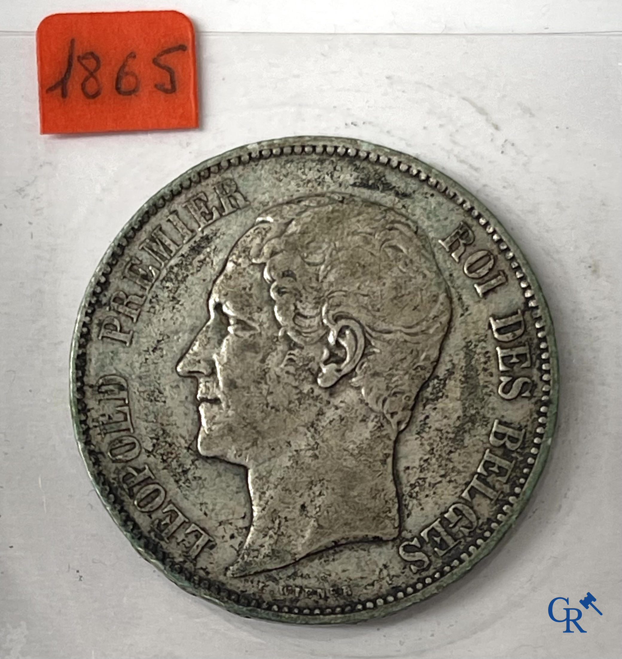 Old coins and banknotes. A large collection of old coins and banknotes. Multiple coins in silver.