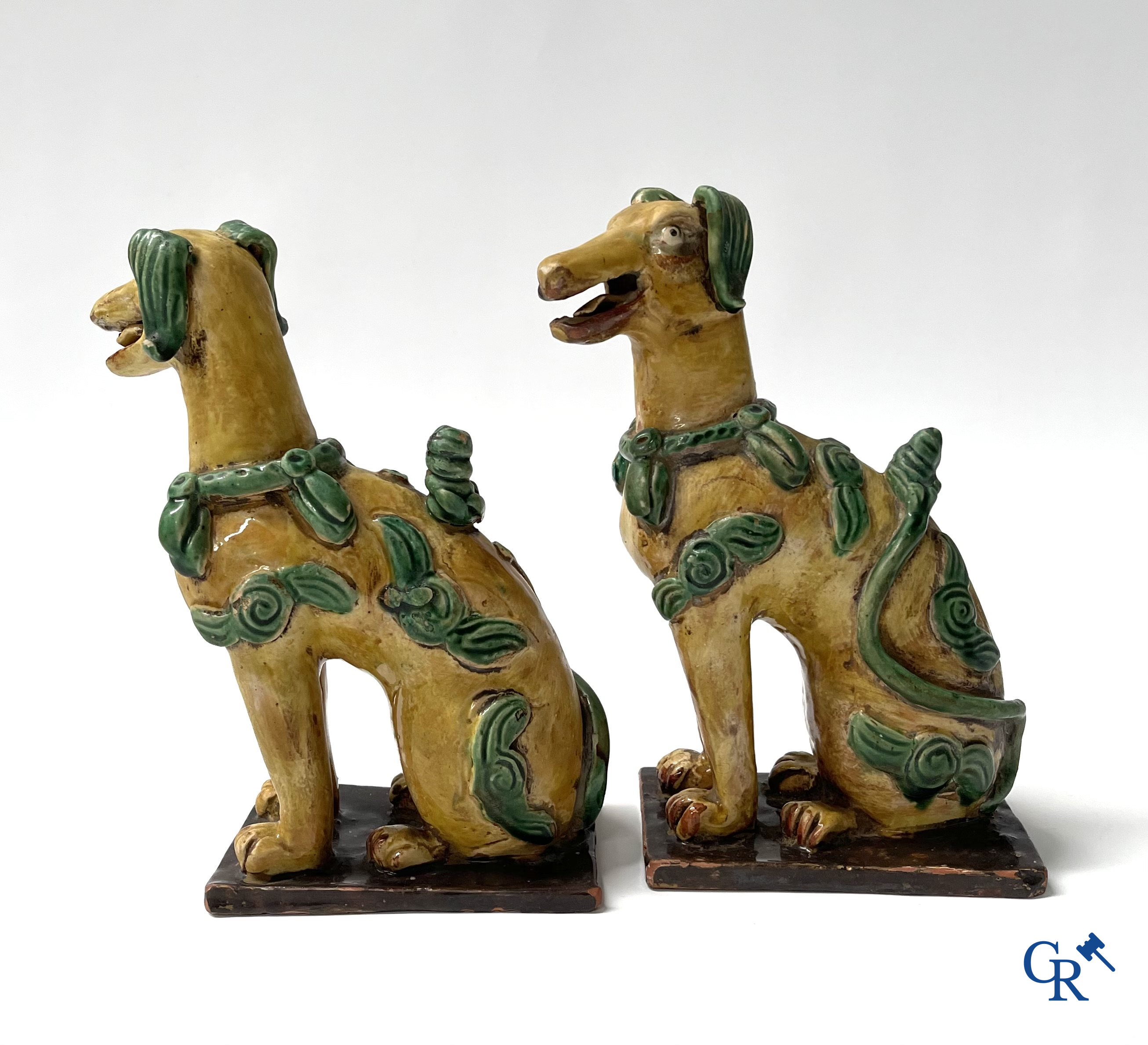 Asian Art, Chine. A pair of seated enamelled terra cotta dogs. 18th-19th century.