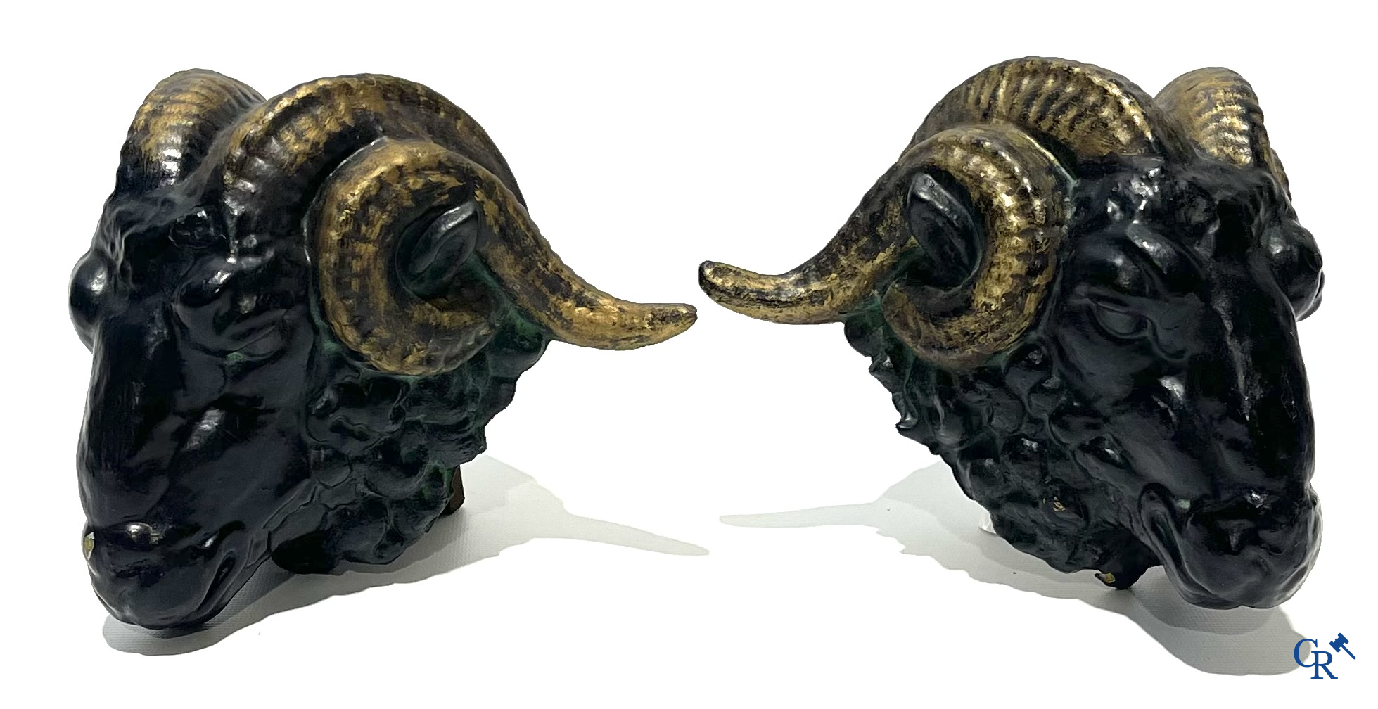 Butchery signboard. Pair of ram heads in zinc serving as façade decoration for a butchery. Circa 1900-1930.
