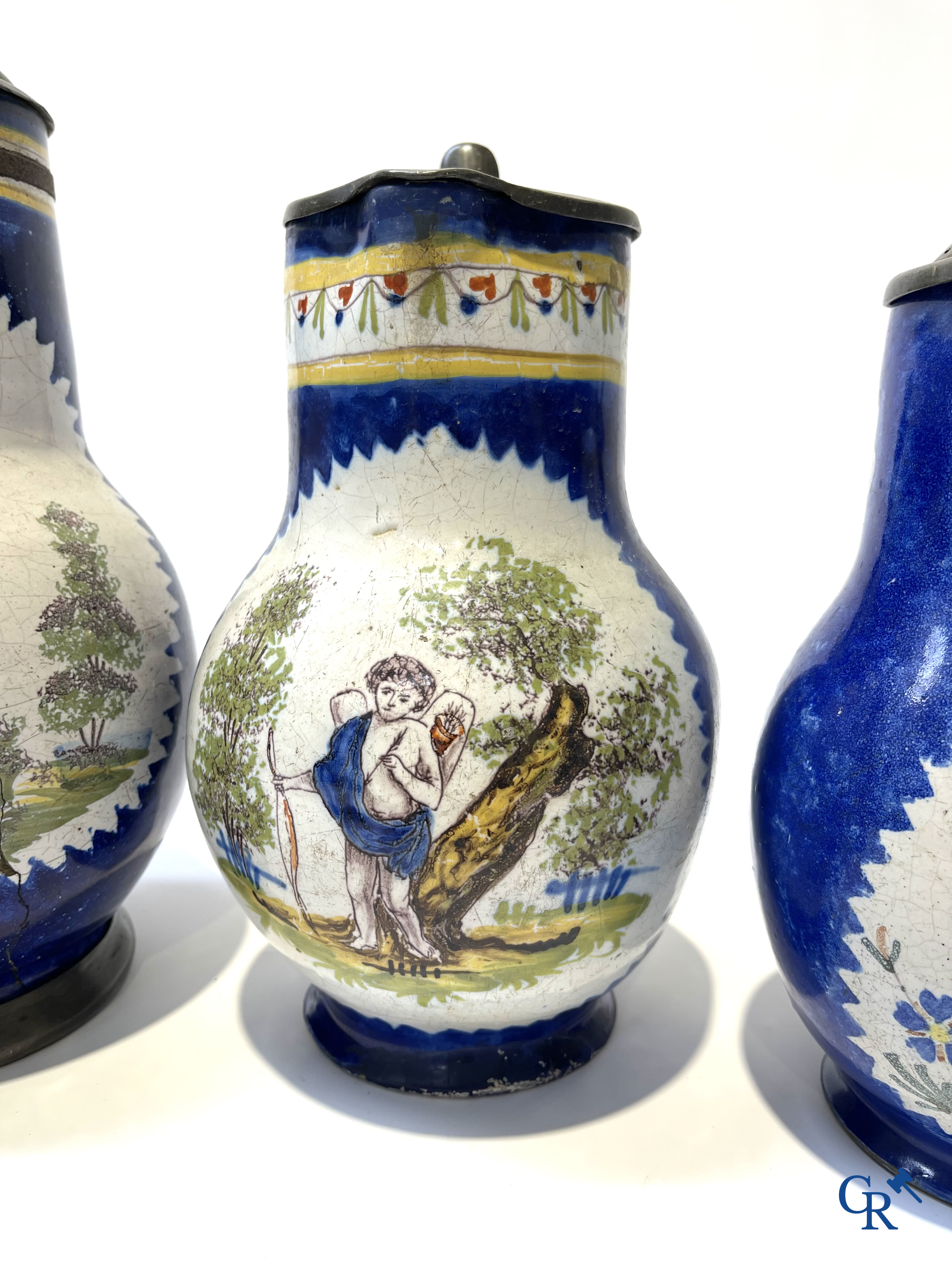 Brussels pottery. 3 jugs with tin lid and a beer jug in decorated Brussels pottery. 18th-19th century.