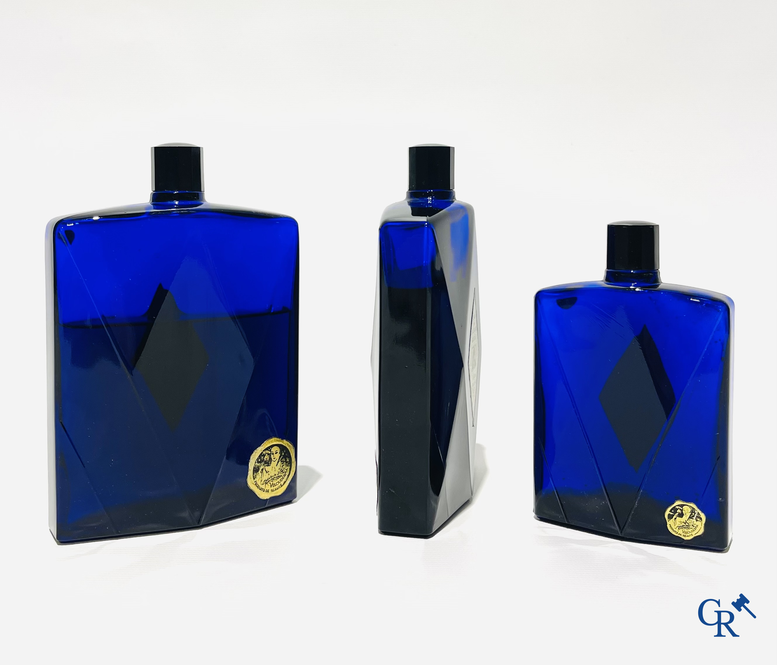 Art Deco. 3 sapphire blue Eau de Cologne bottles for Eau de Cologne Russe by Gilles August & Cie. 1940's.