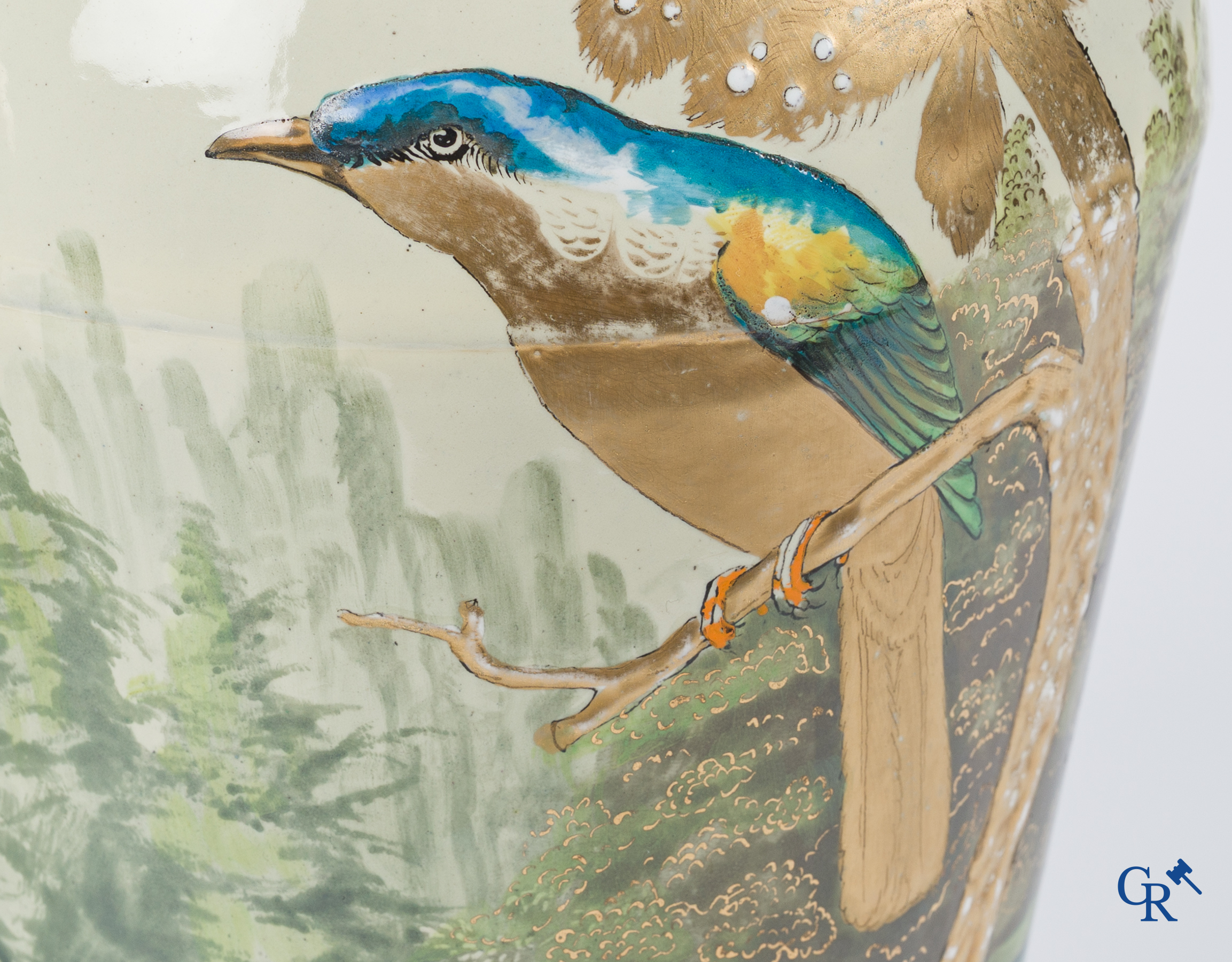 Pair of embossed enamelled metal vases with a decor of birds. Circa 1900.