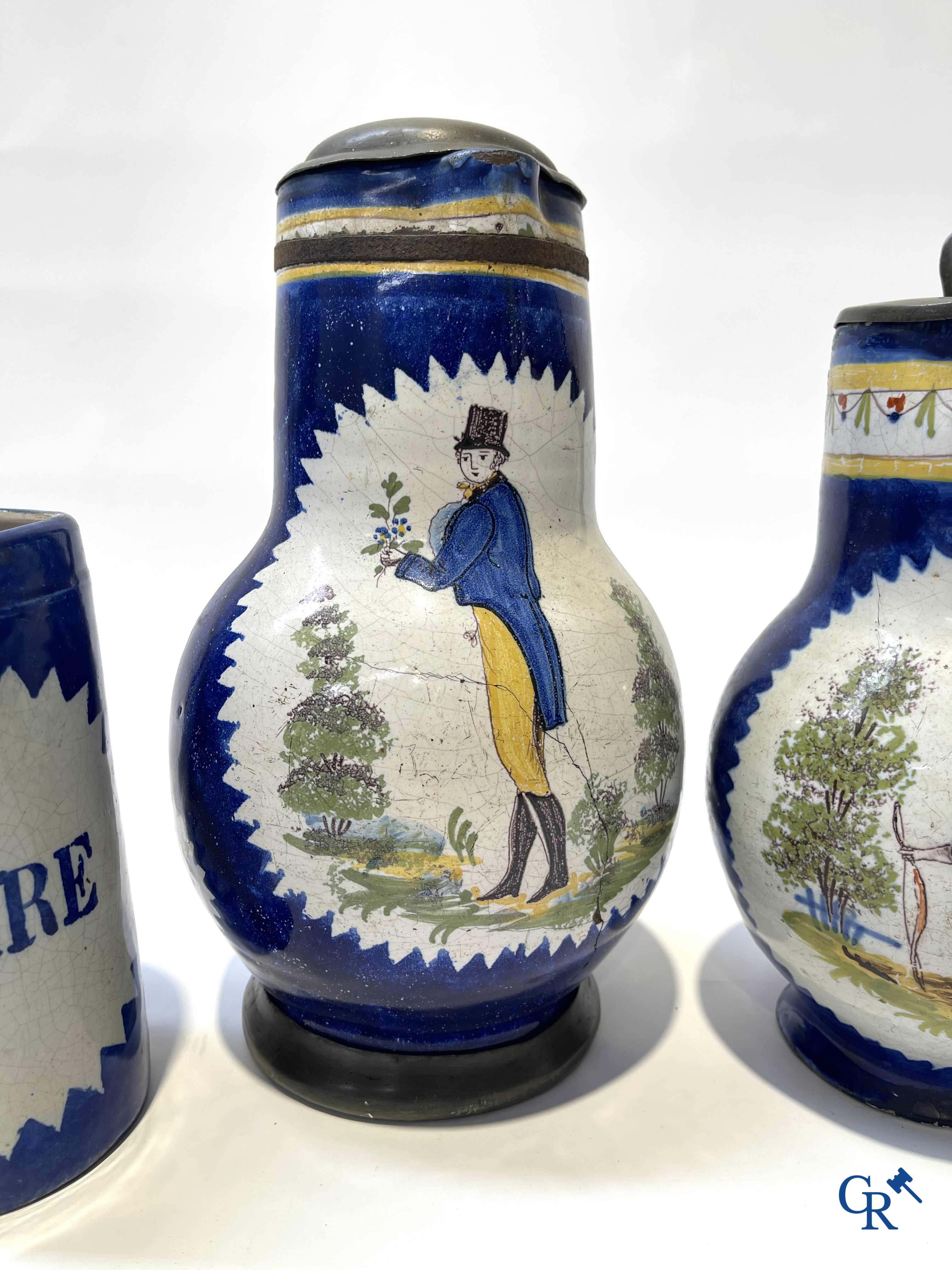 Brussels pottery. 3 jugs with tin lid and a beer jug in decorated Brussels pottery. 18th-19th century.