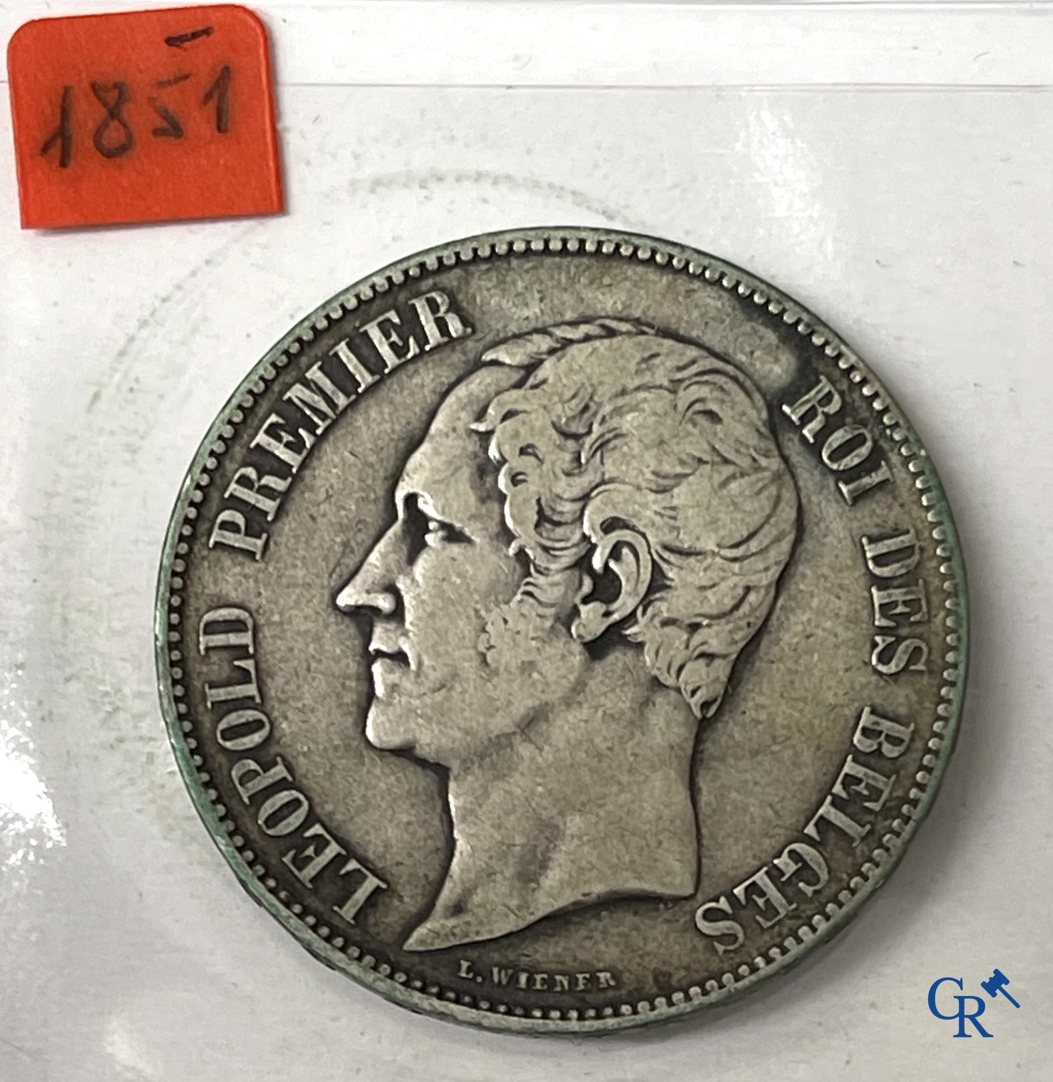 Old coins and banknotes. A large collection of old coins and banknotes. Multiple coins in silver.