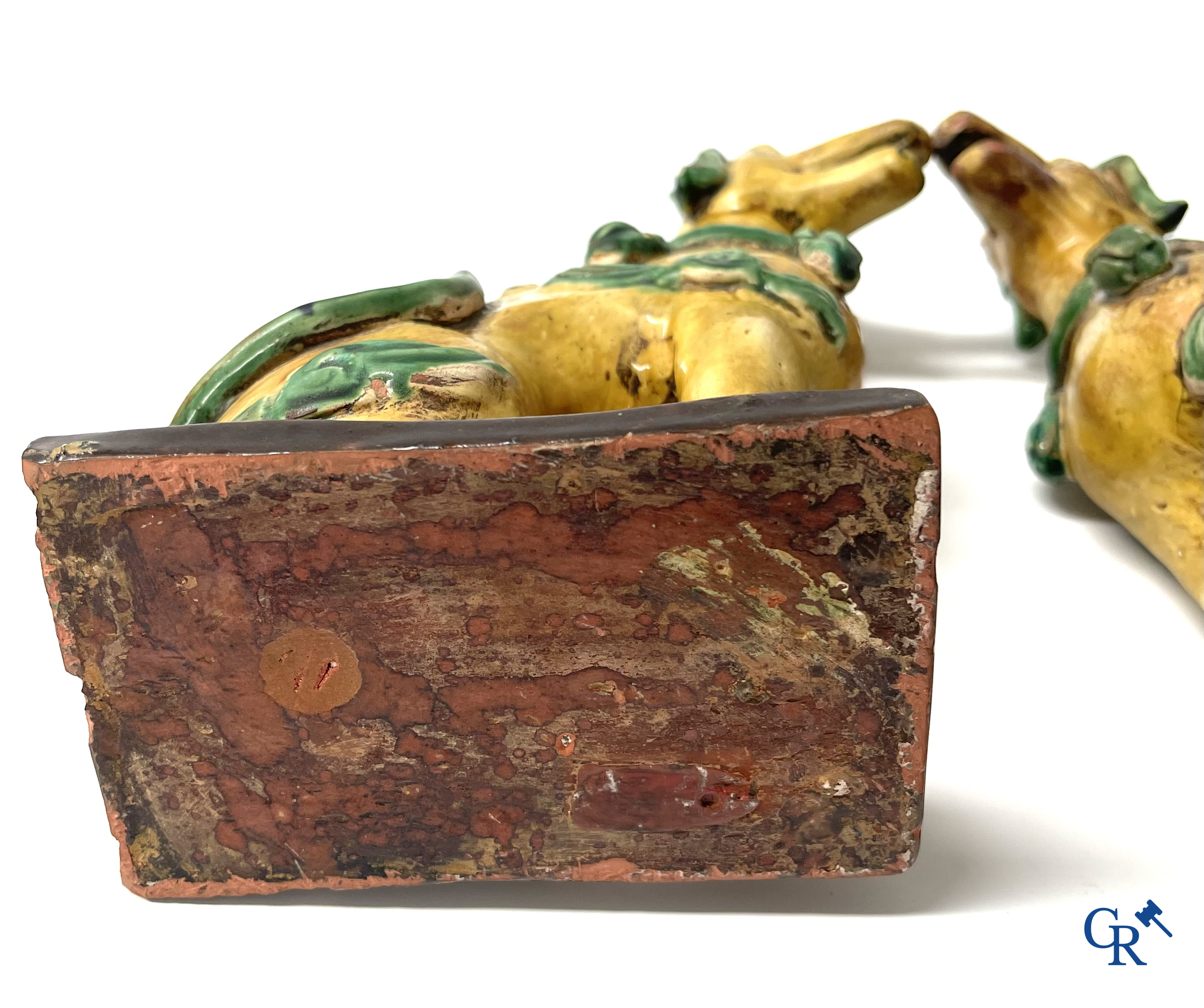 Asian Art, Chine. A pair of seated enamelled terra cotta dogs. 18th-19th century.