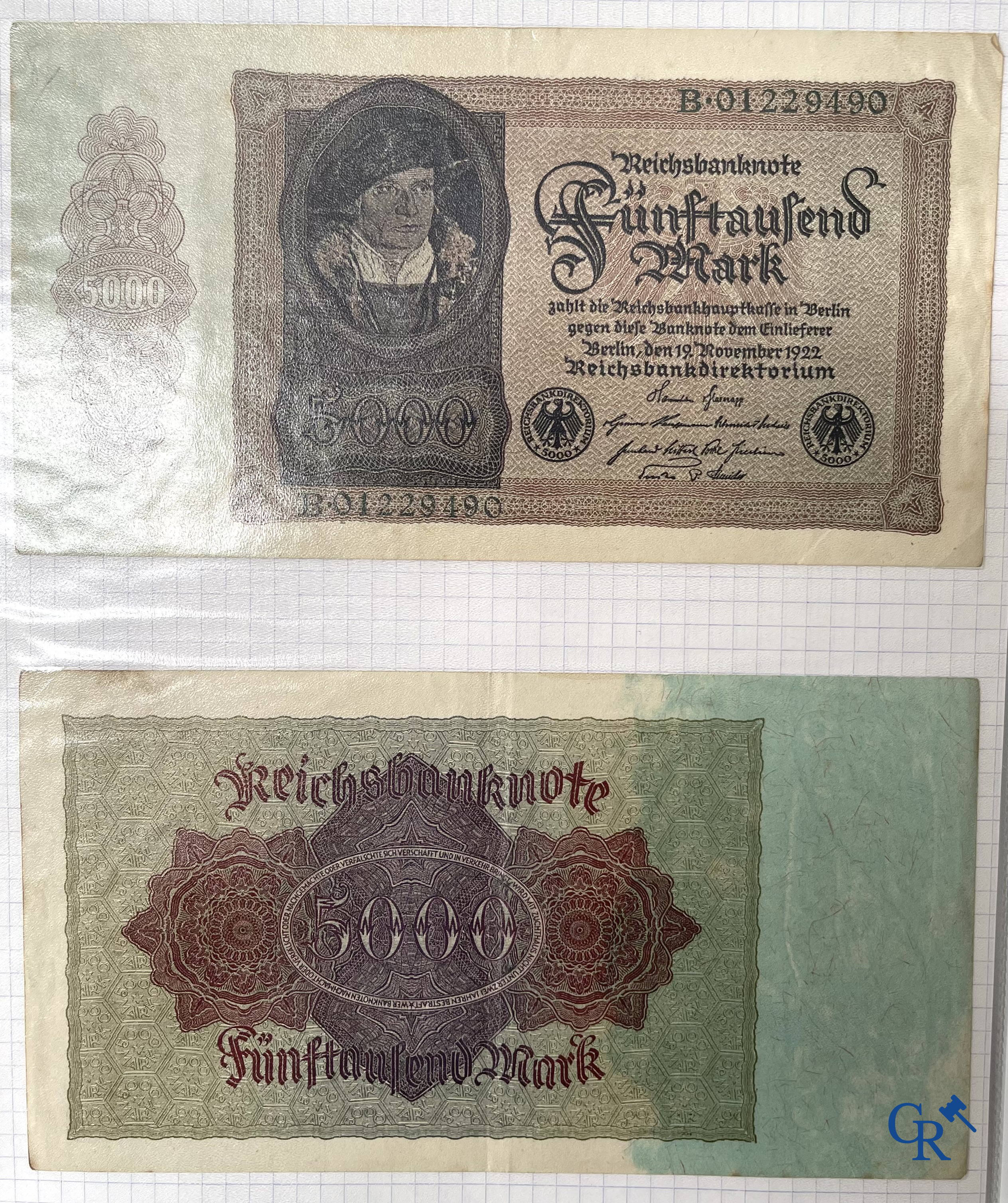 Old coins and banknotes. A large collection of old coins and banknotes. Multiple coins in silver.