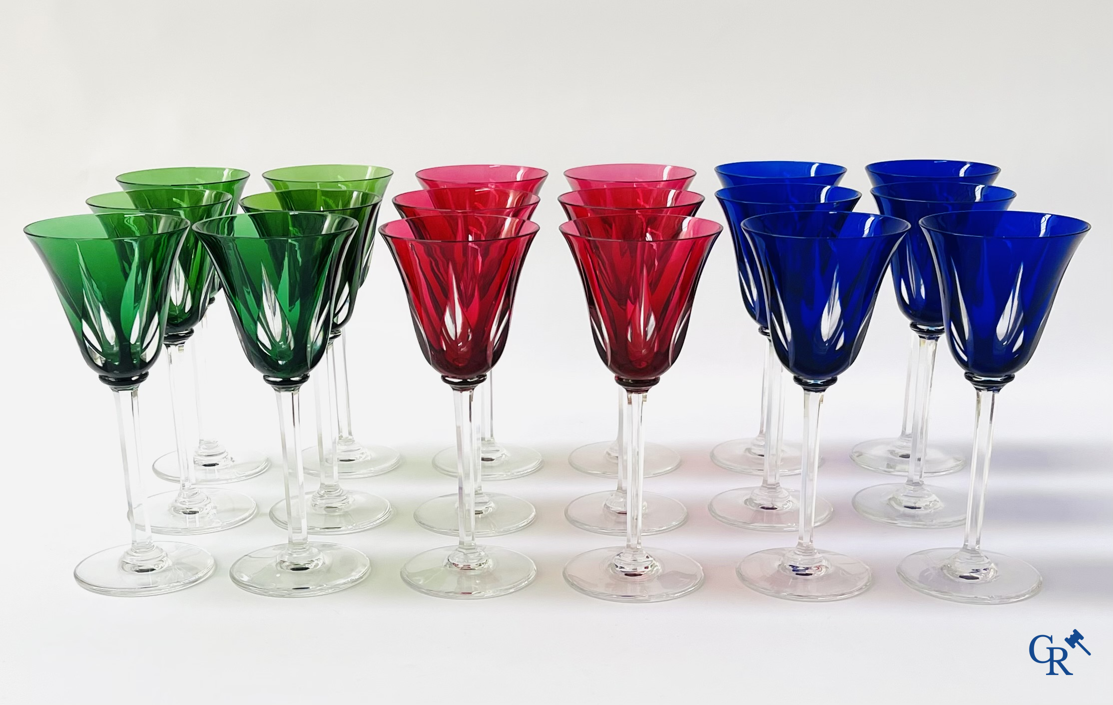 Cristal St. Louis France. A set of 18 coloured and cut glasses in crystal of Saint-Louis. In the original box.