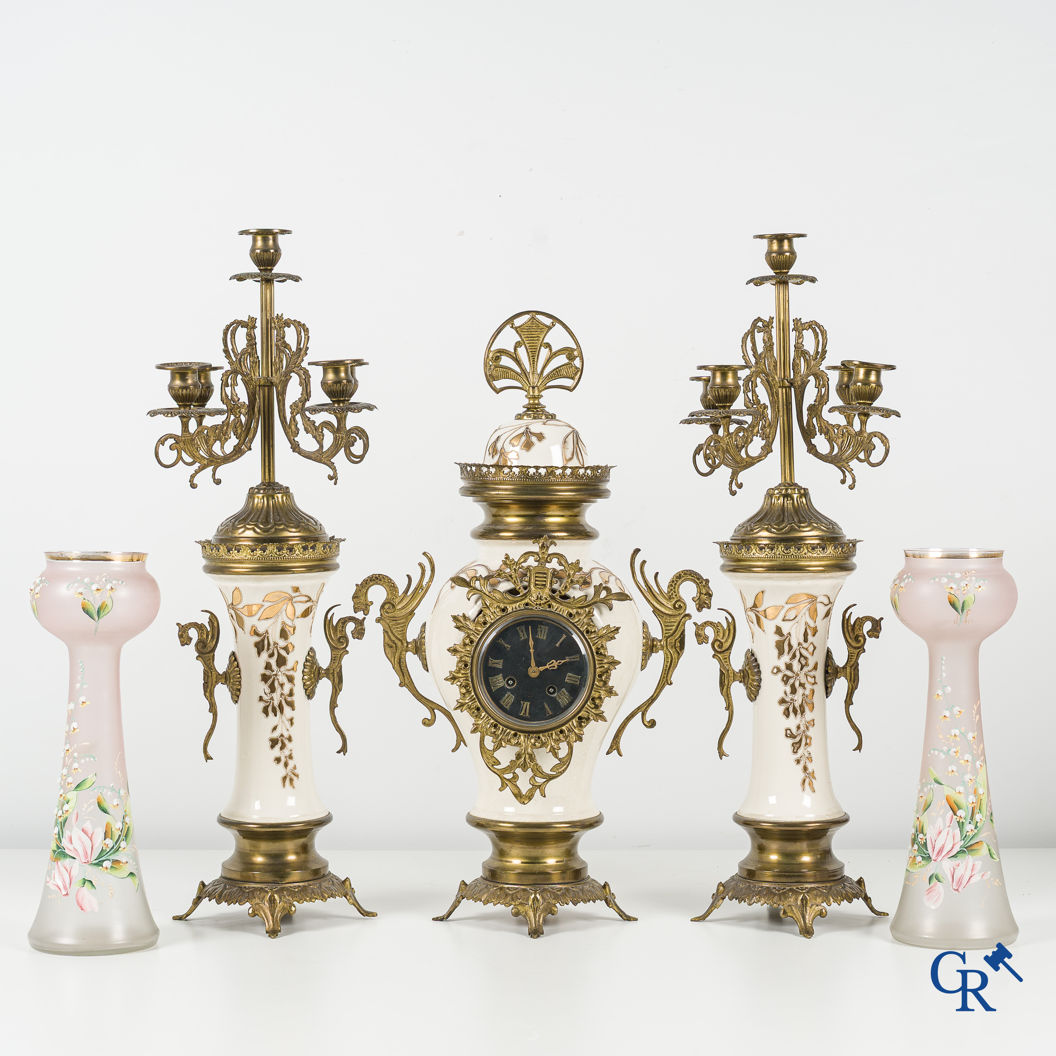 Art Nouveau. Lot consisting of a clock set in faience and bronze and a pair enamelled opaline vases.