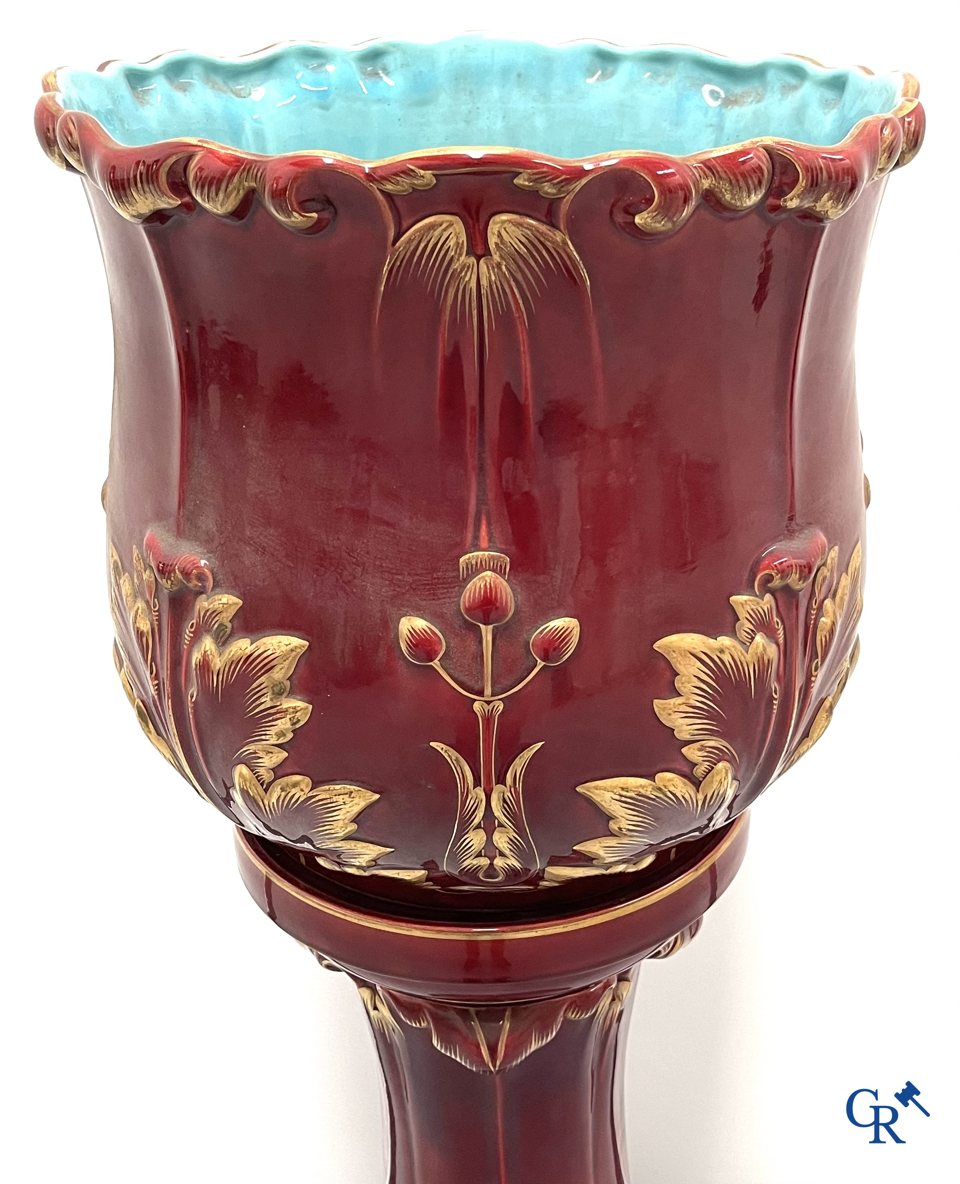 Art Nouveau, Sarreguemines. A jardiniere in enamelled faience or barbotine on his stand. Around 1910.