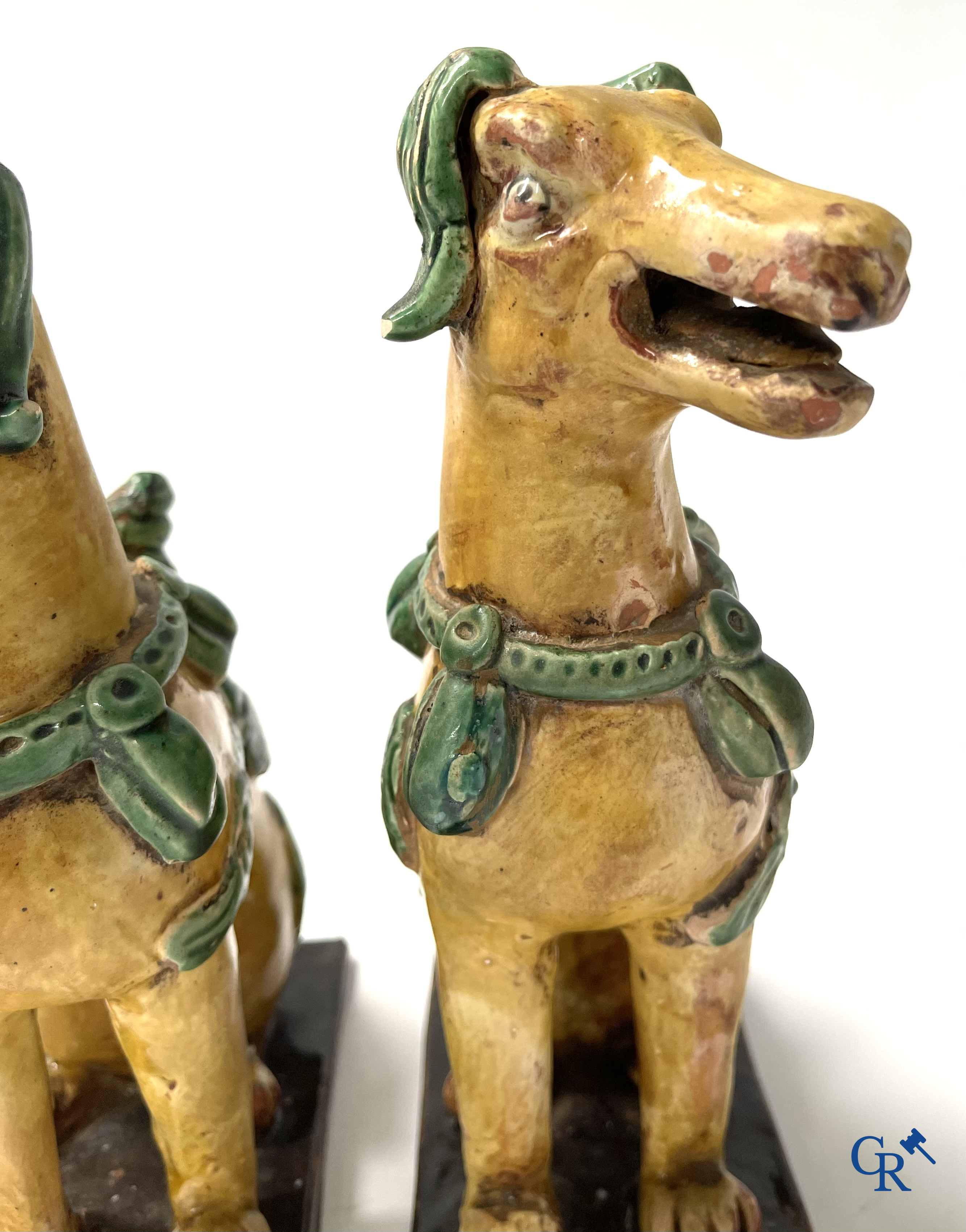 Asian Art, Chine. A pair of seated enamelled terra cotta dogs. 18th-19th century.