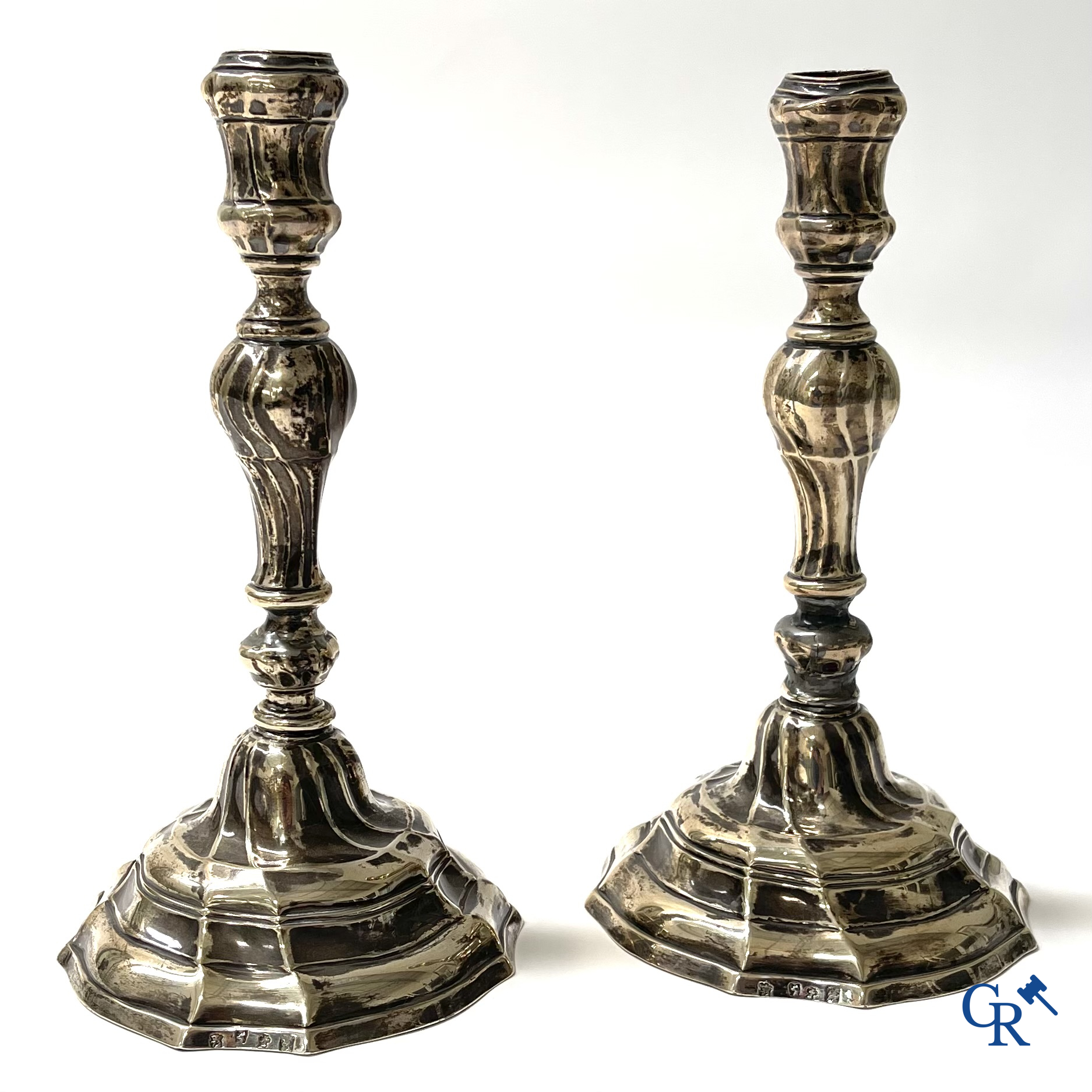 Silver. A pair of 18th century silver candlesticks. Multiple hallmarks.