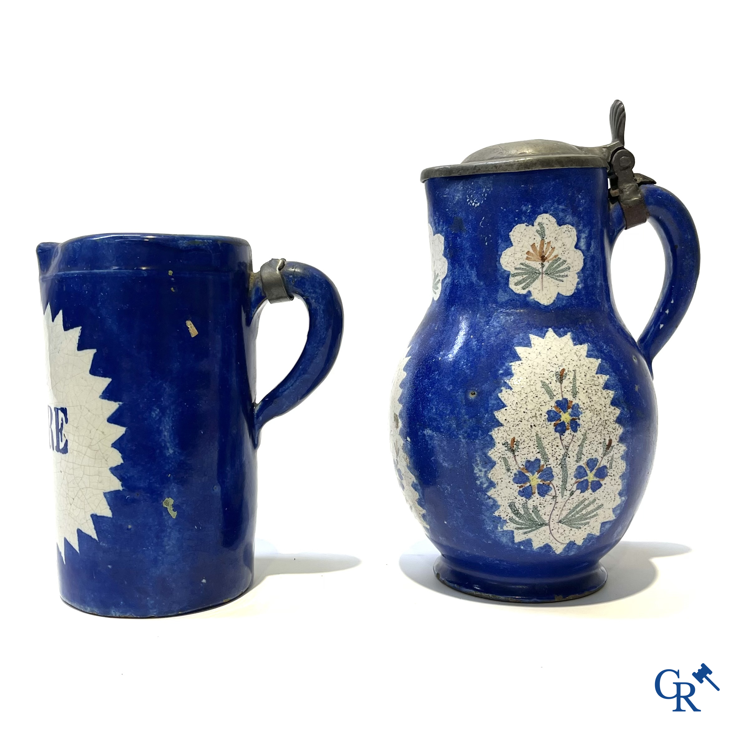 Brussels pottery. 3 jugs with tin lid and a beer jug in decorated Brussels pottery. 18th-19th century.