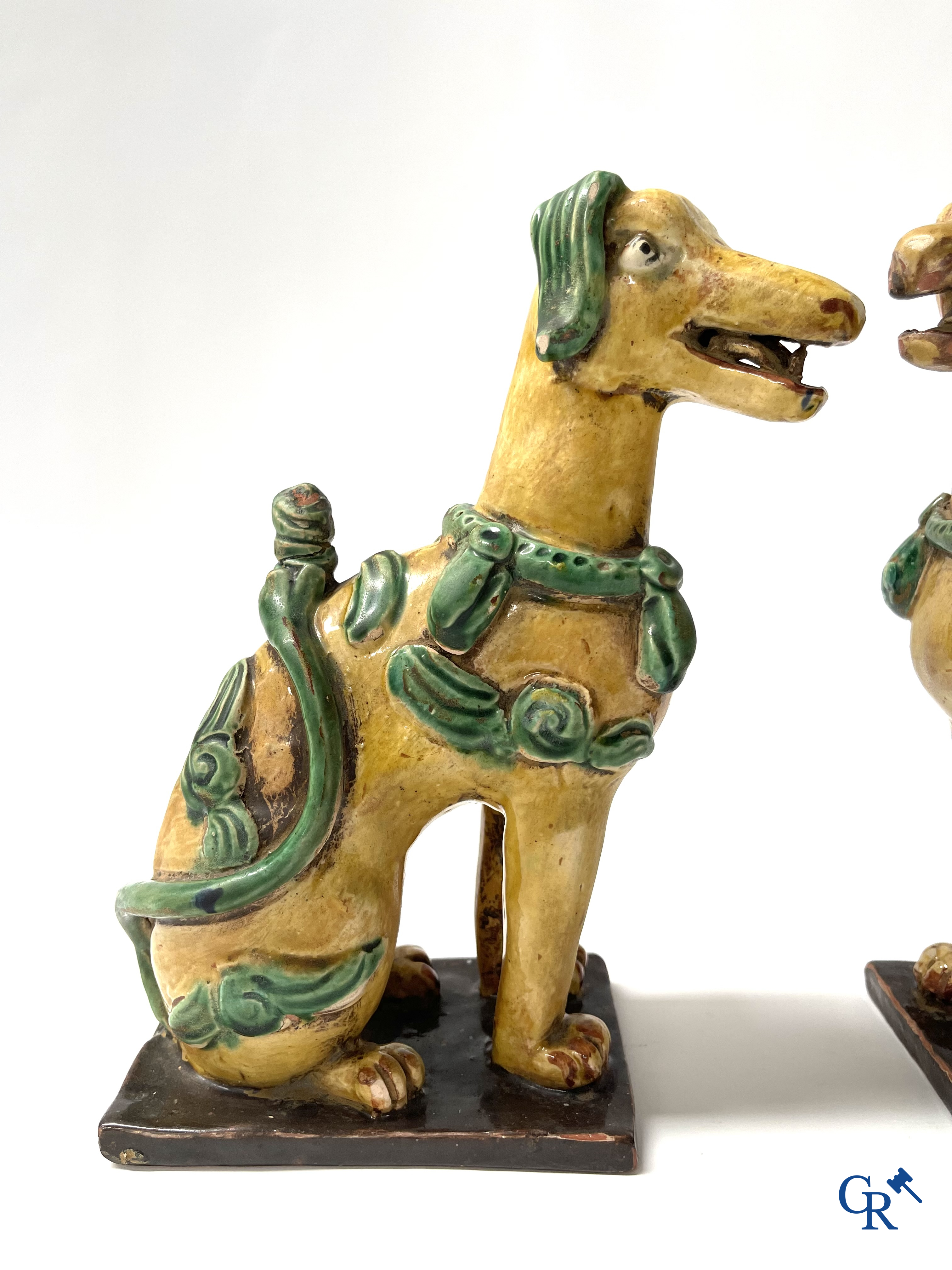 Asian Art, Chine. A pair of seated enamelled terra cotta dogs. 18th-19th century.