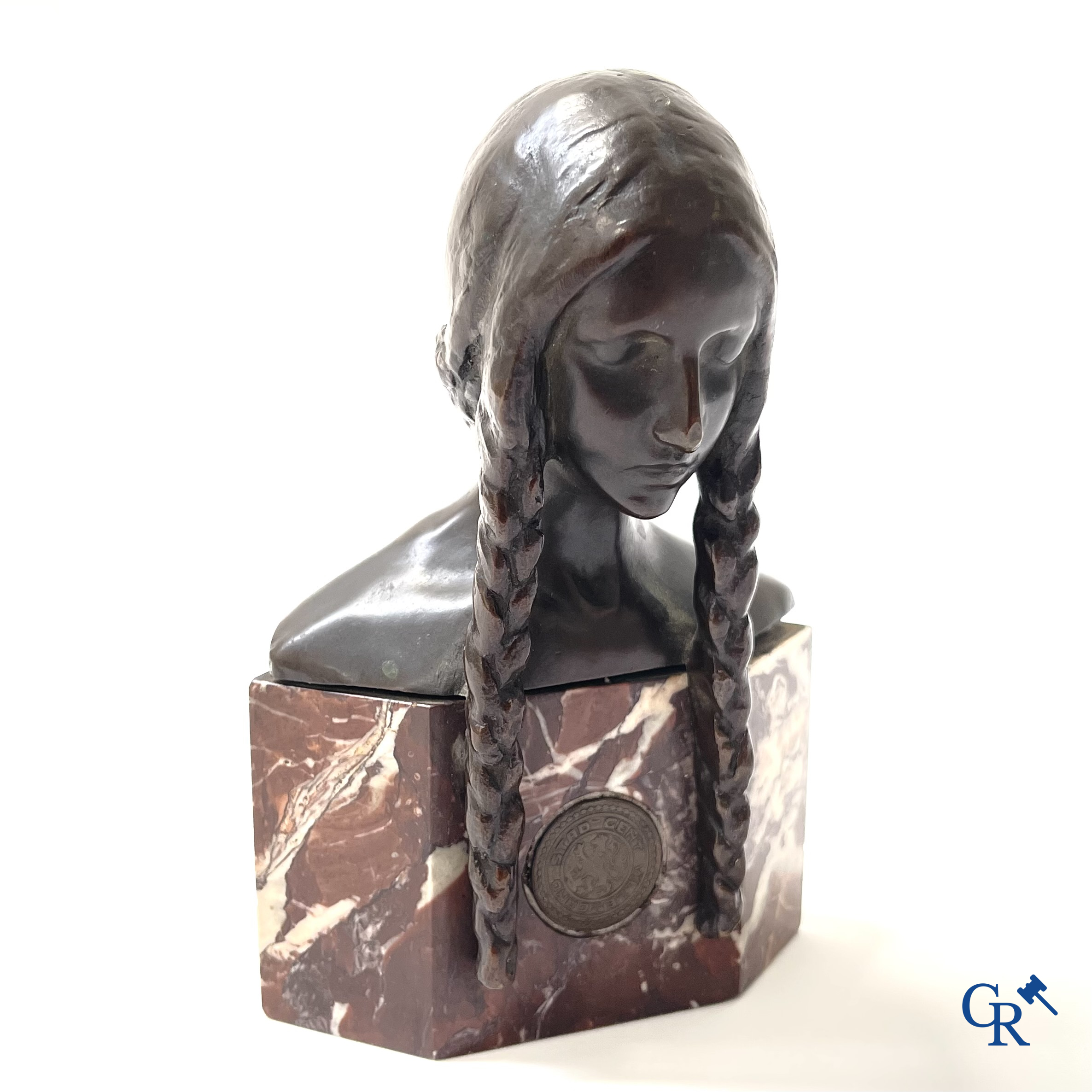 Dominique Van Den Bossche (1854-1906) Bronze bust of a girl on a marble pedestal. Incorporated medal city of Ghent.