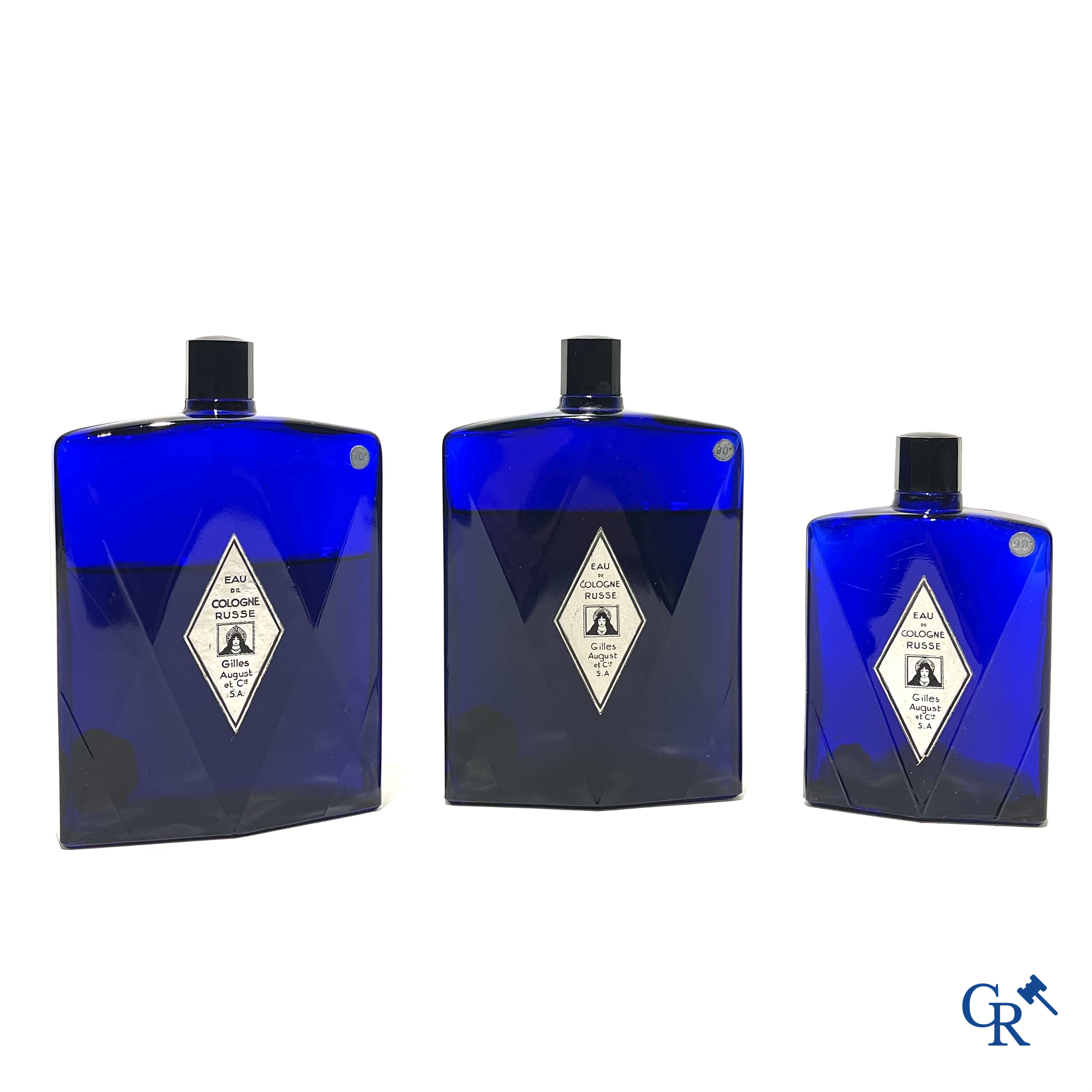 Art Deco. 3 sapphire blue Eau de Cologne bottles for Eau de Cologne Russe by Gilles August & Cie. 1940's.