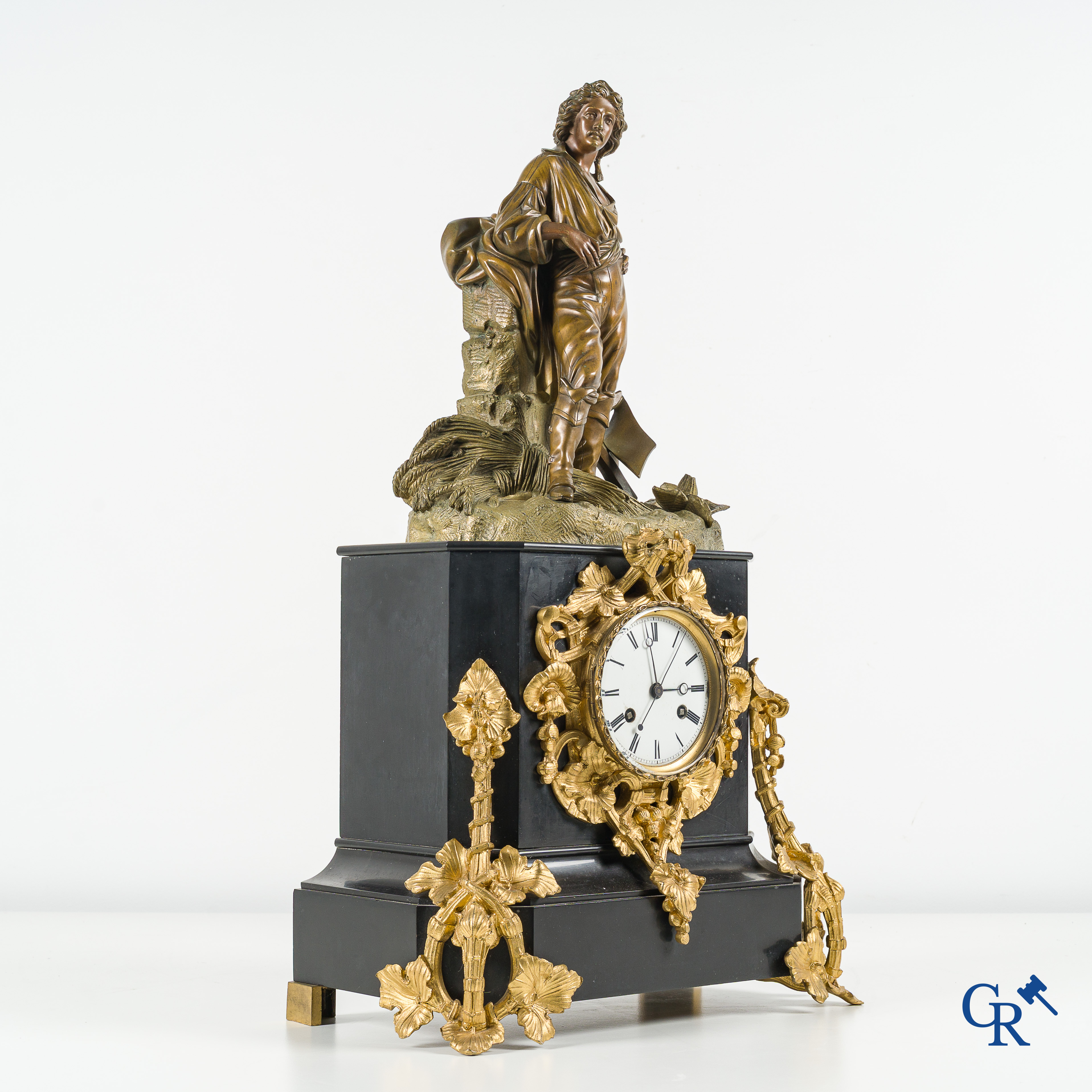 Large fireplace clock in black marble and bronze. Enamelled dial and minute indication. Napoleon III Period.