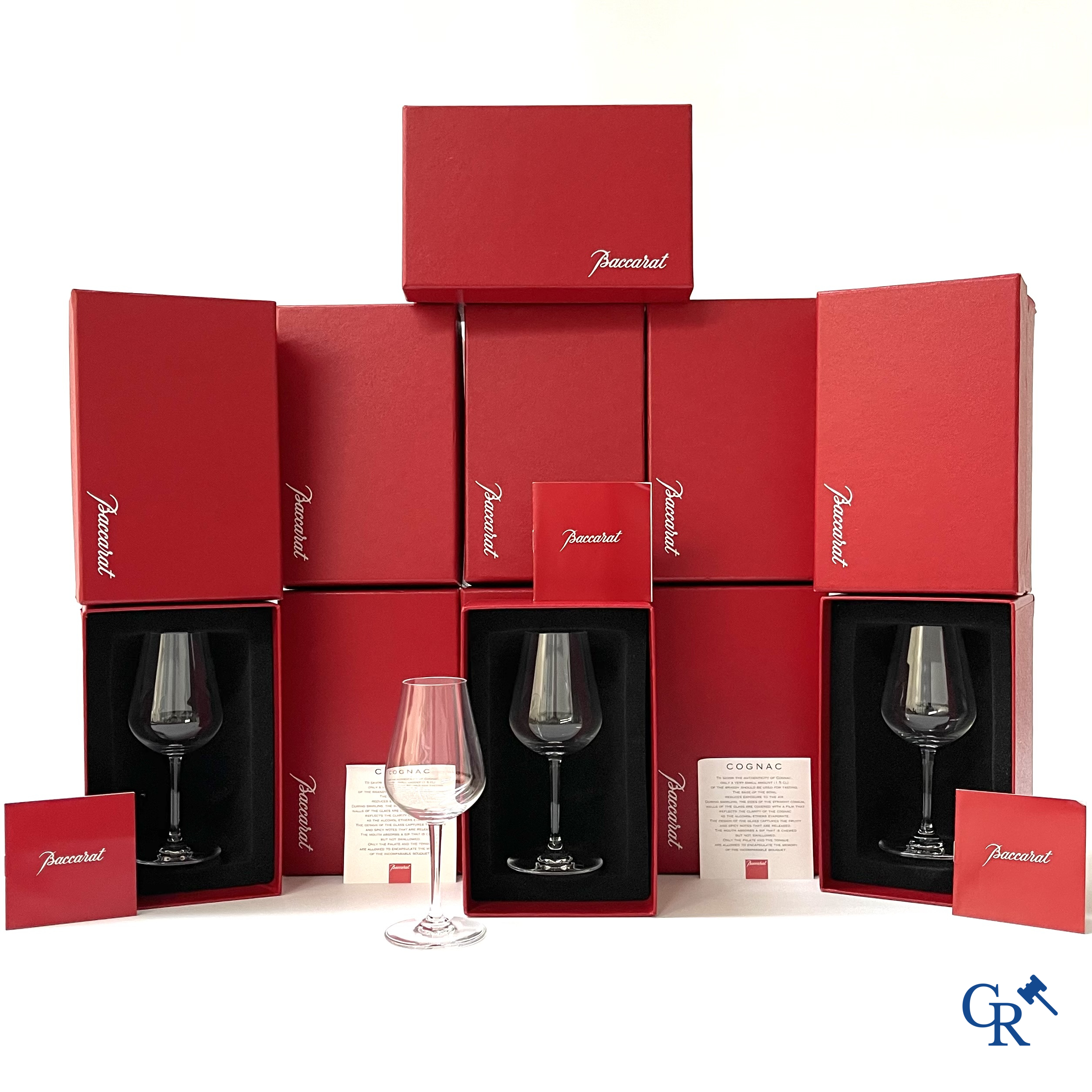 Baccarat. A set of 12 crystal cognac glasses in their original red box. Signed. New condition.