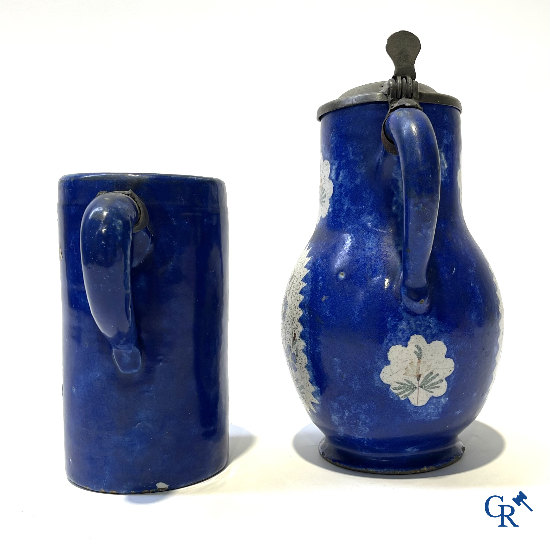 Brussels pottery. 3 jugs with tin lid and a beer jug in decorated Brussels pottery. 18th-19th century.