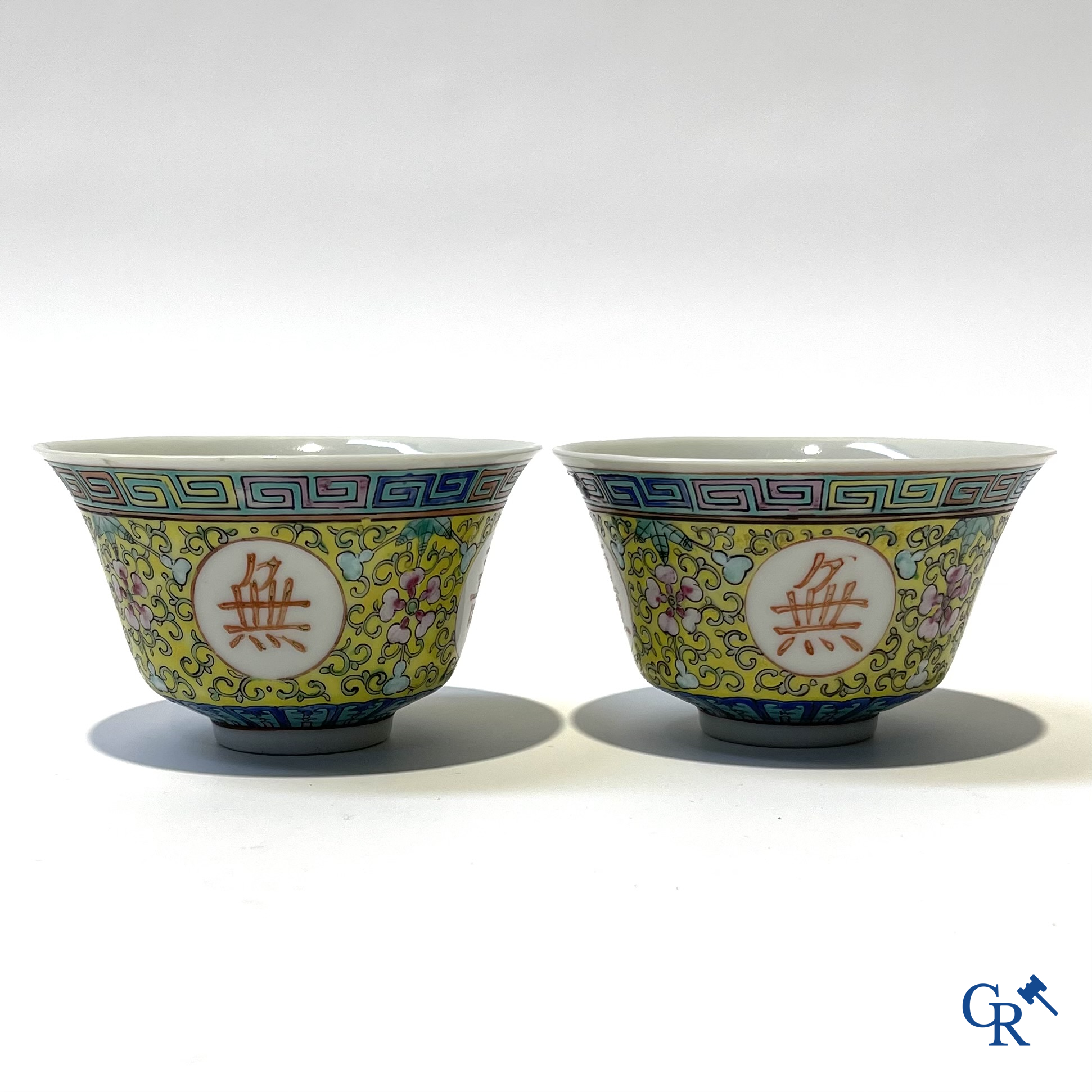 Asian Art, Chinese porcelain. A few finely decorated famille rose cups with lid. Marked.