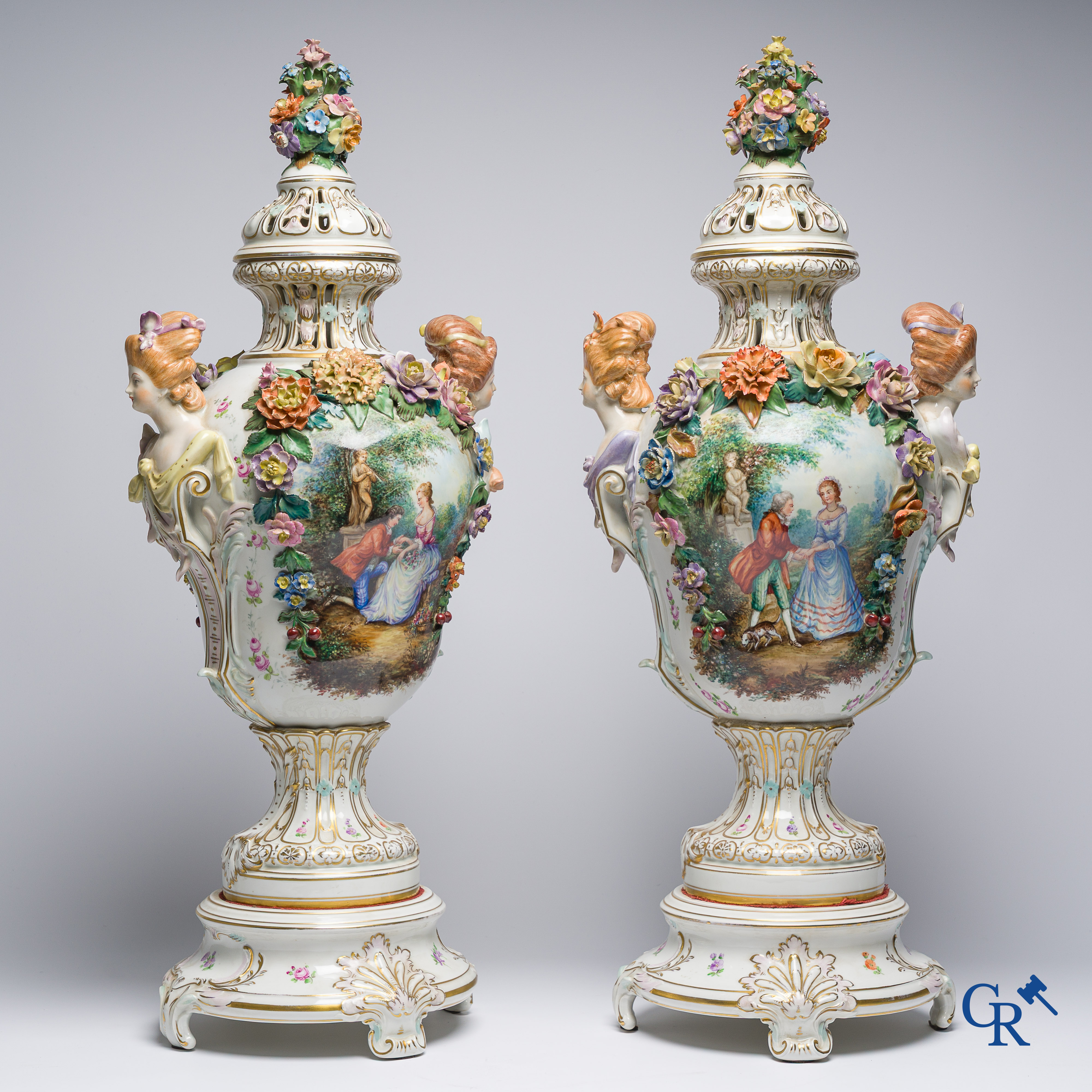 Dresden, German porcelain. Pair of large lid vases with romantic scenes. On base. Marked and numbered.